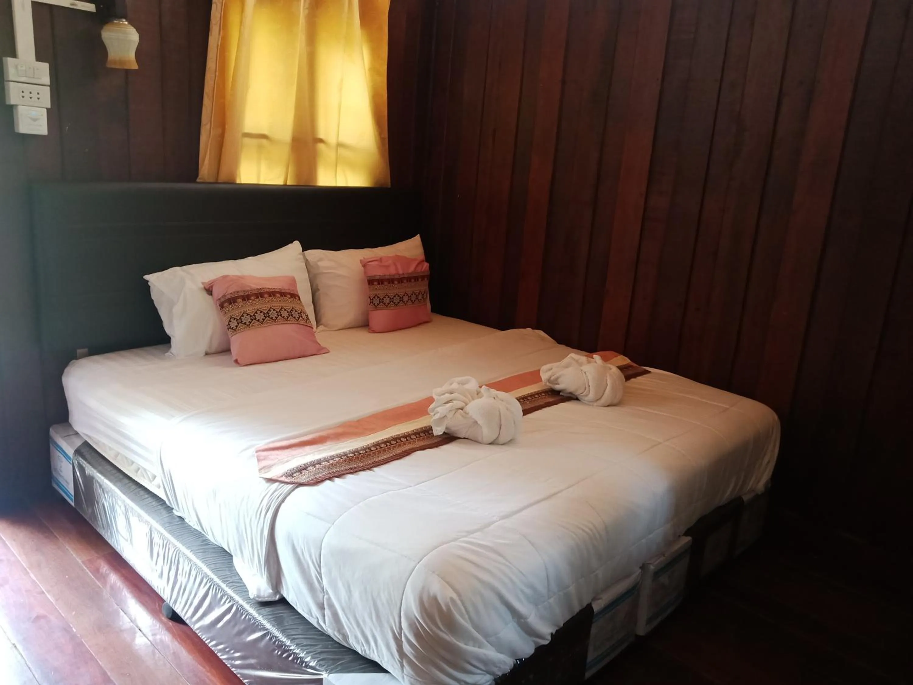 Bed in Sisatchanalai Heritage Resort