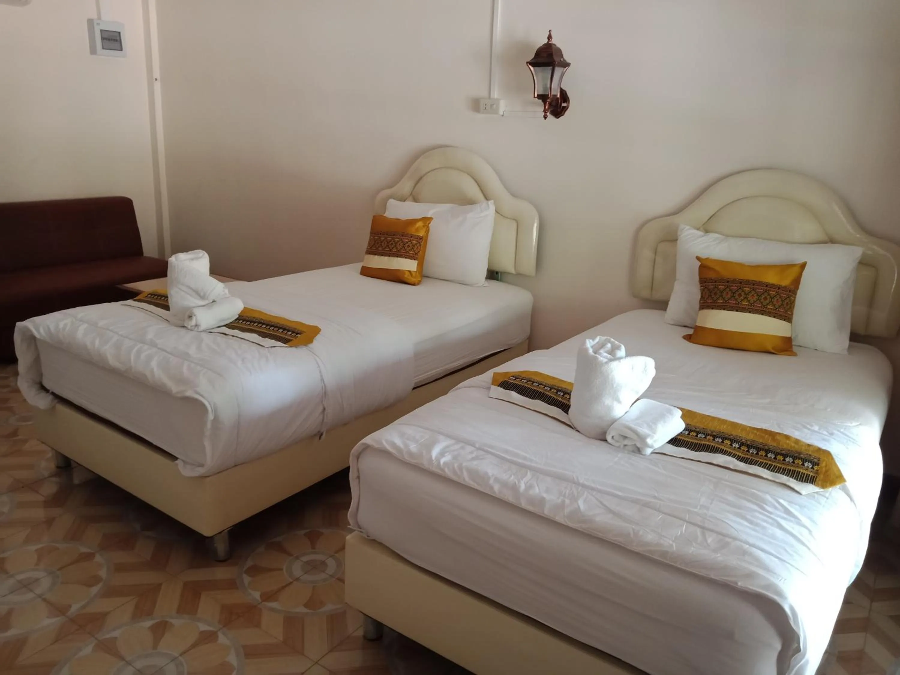 Bed in Sisatchanalai Heritage Resort