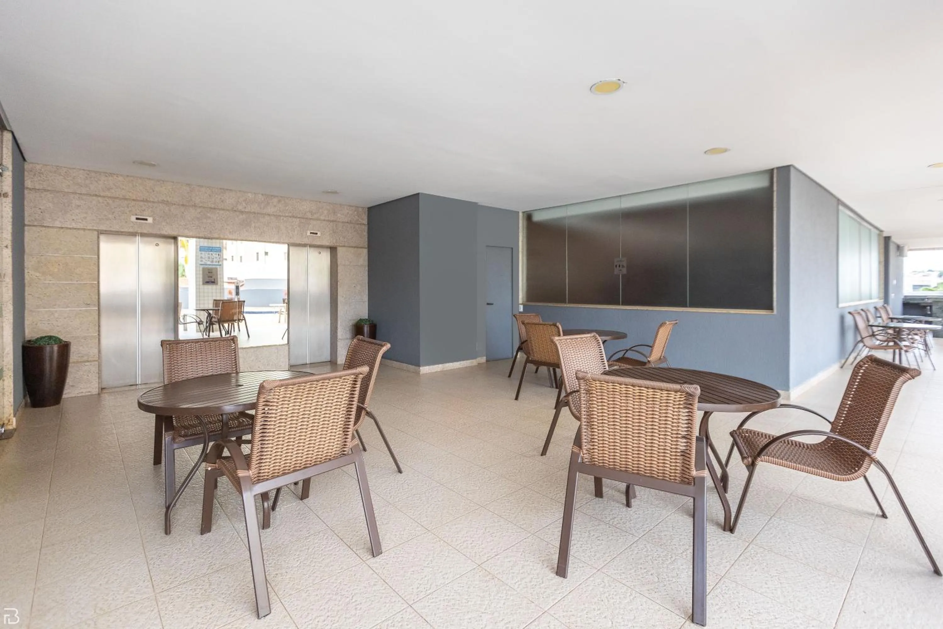 Seating area in Nobile Suítes Uberlândia