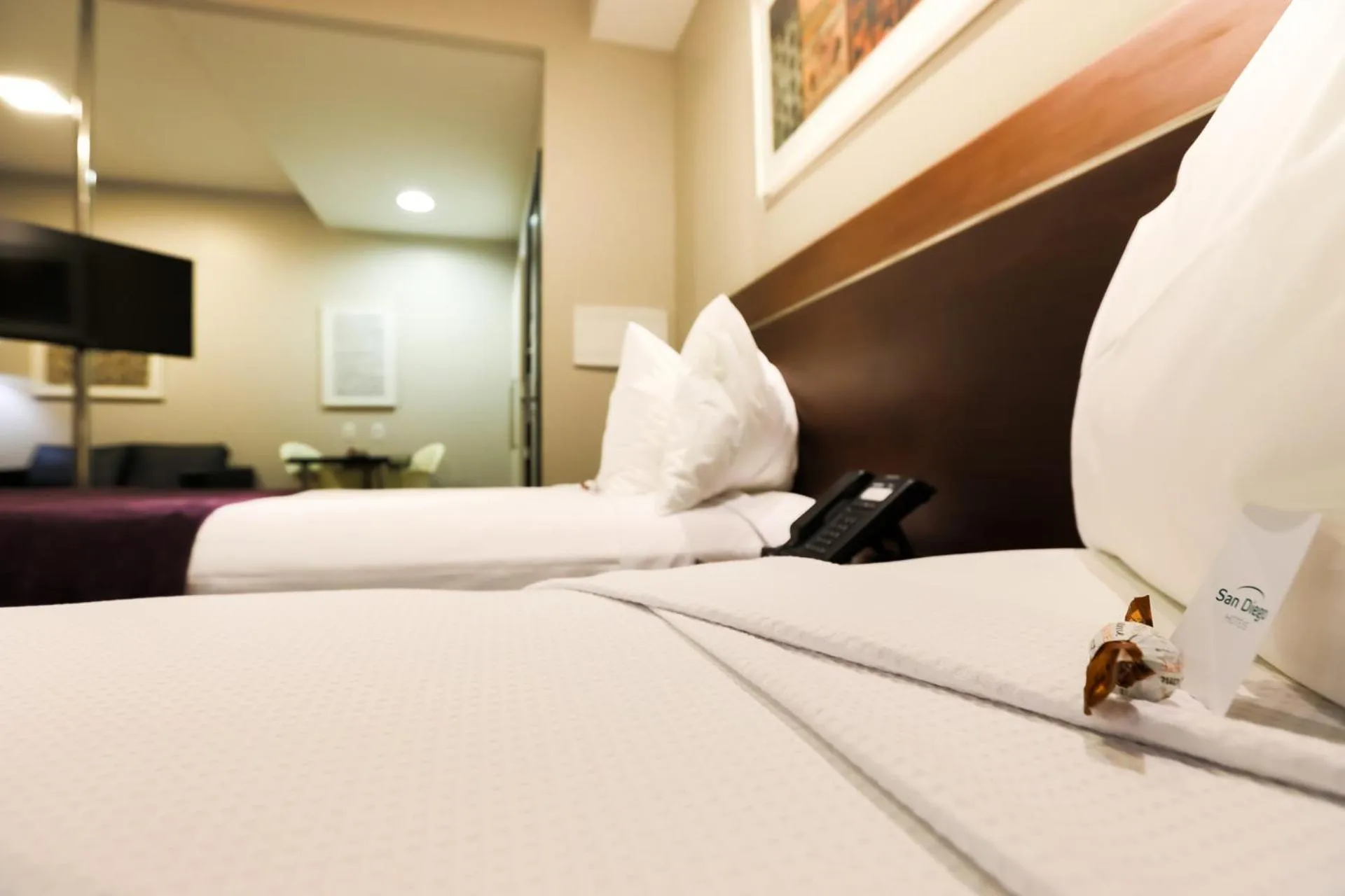 Bed in San Diego Suites Ipatinga