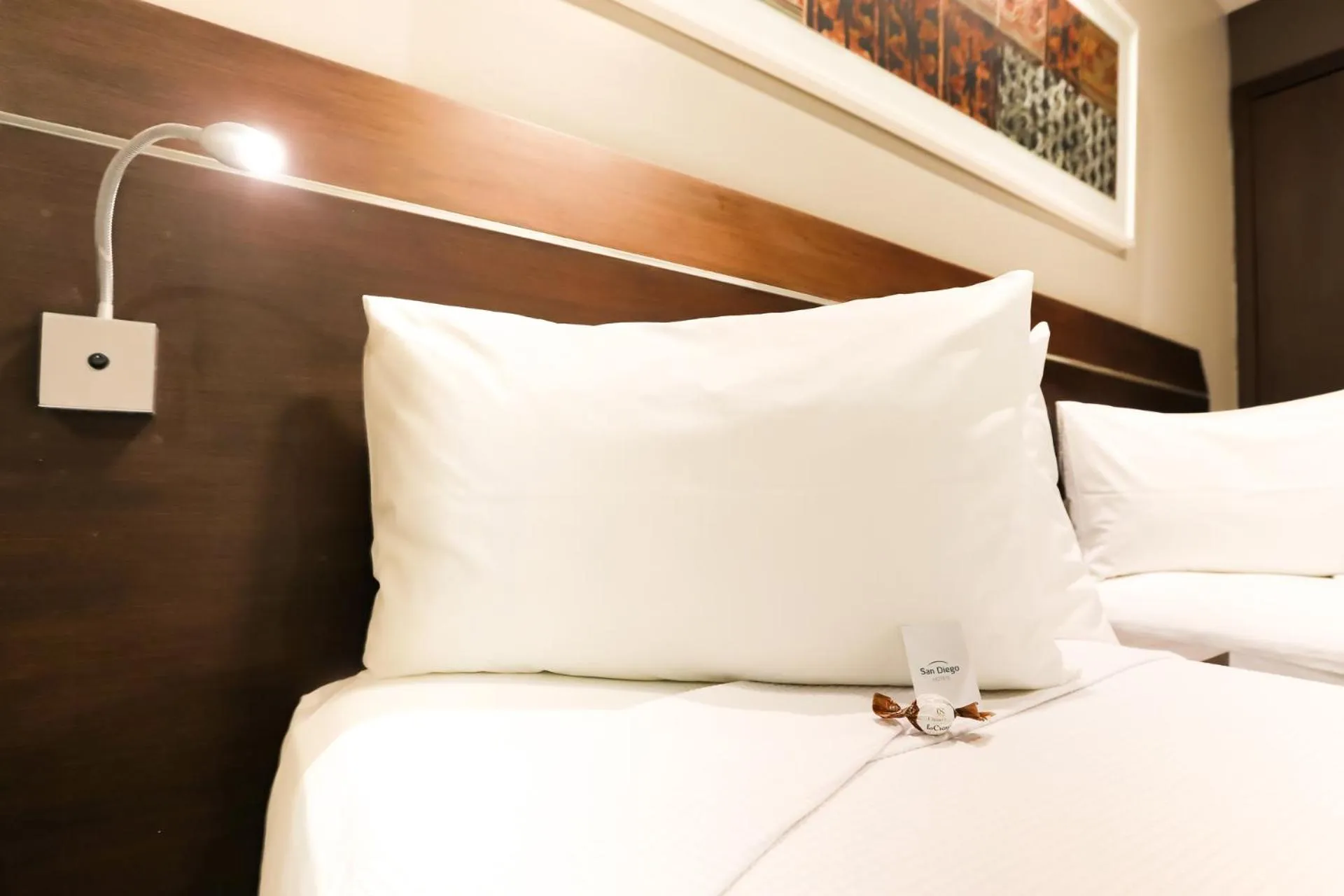 Bed in San Diego Suites Ipatinga