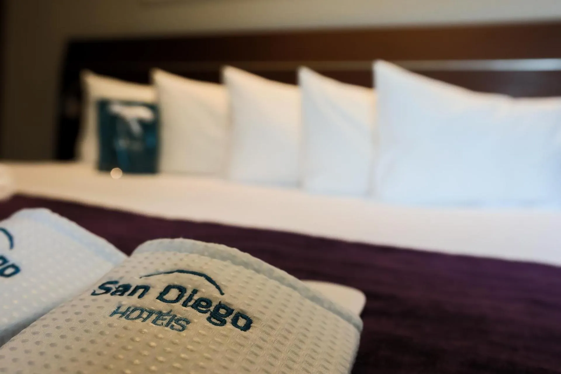 Bed in San Diego Suites Ipatinga