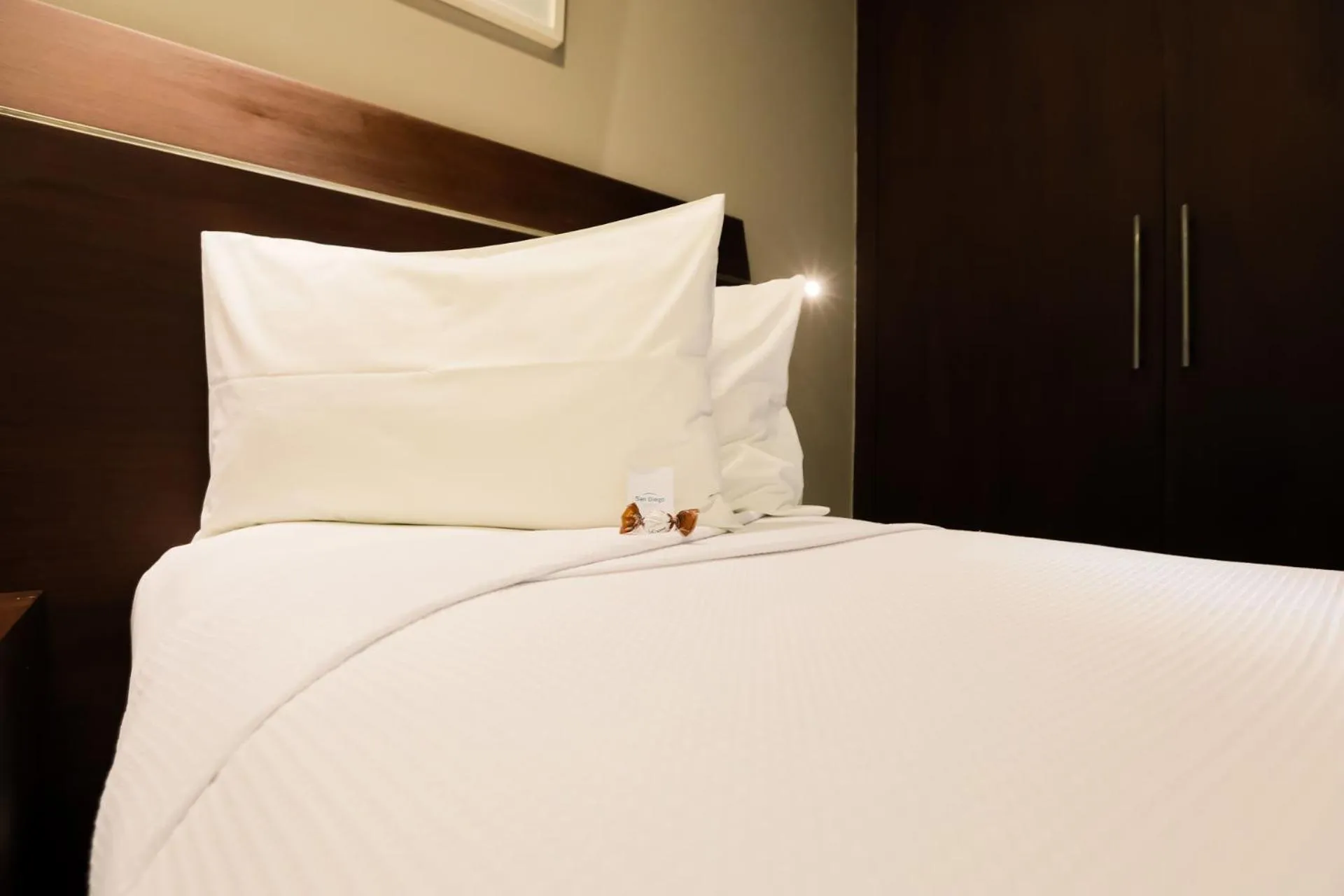 Bed in San Diego Suites Ipatinga