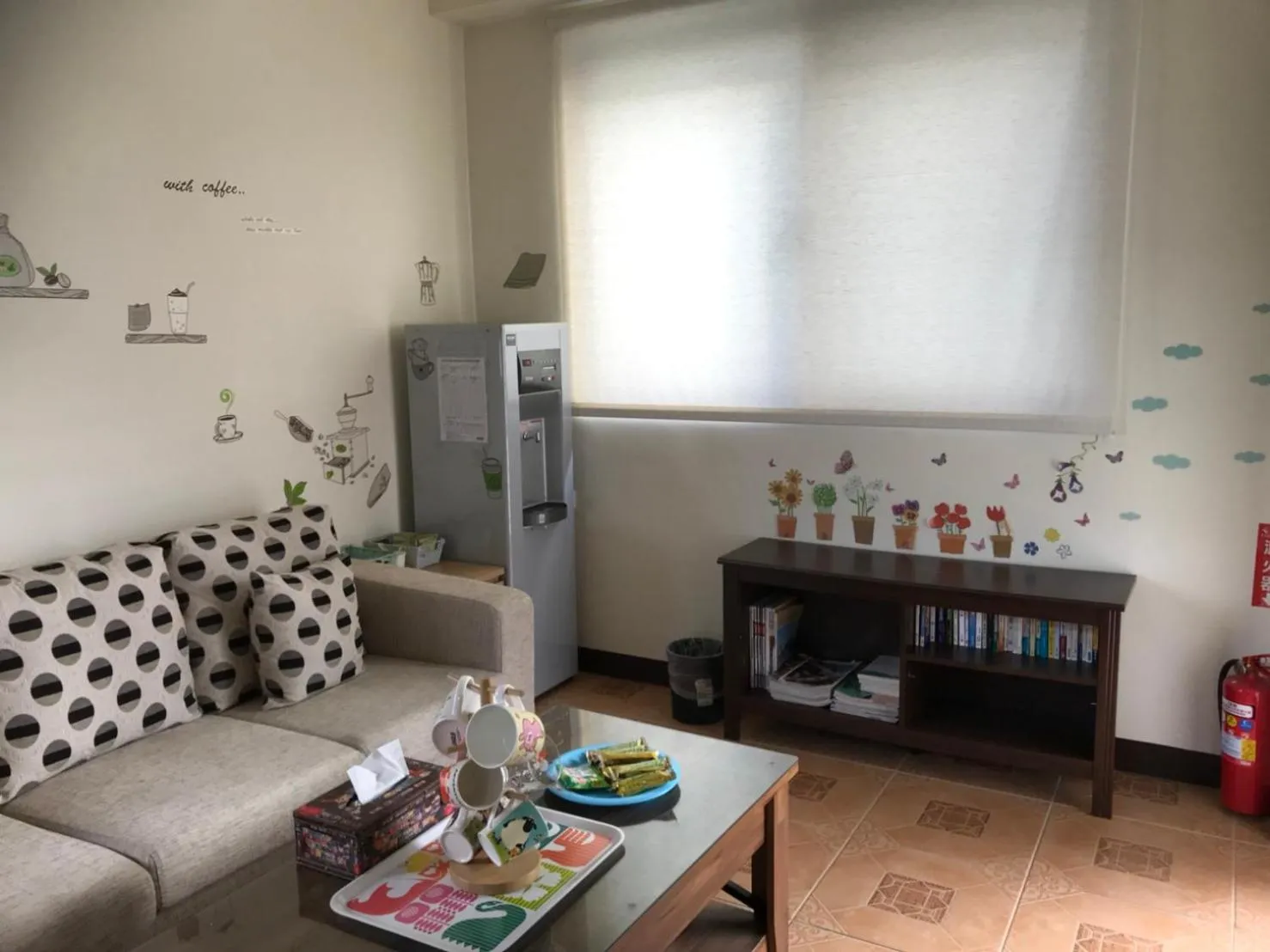 Communal lounge/ TV room in Seven beauties Homestay