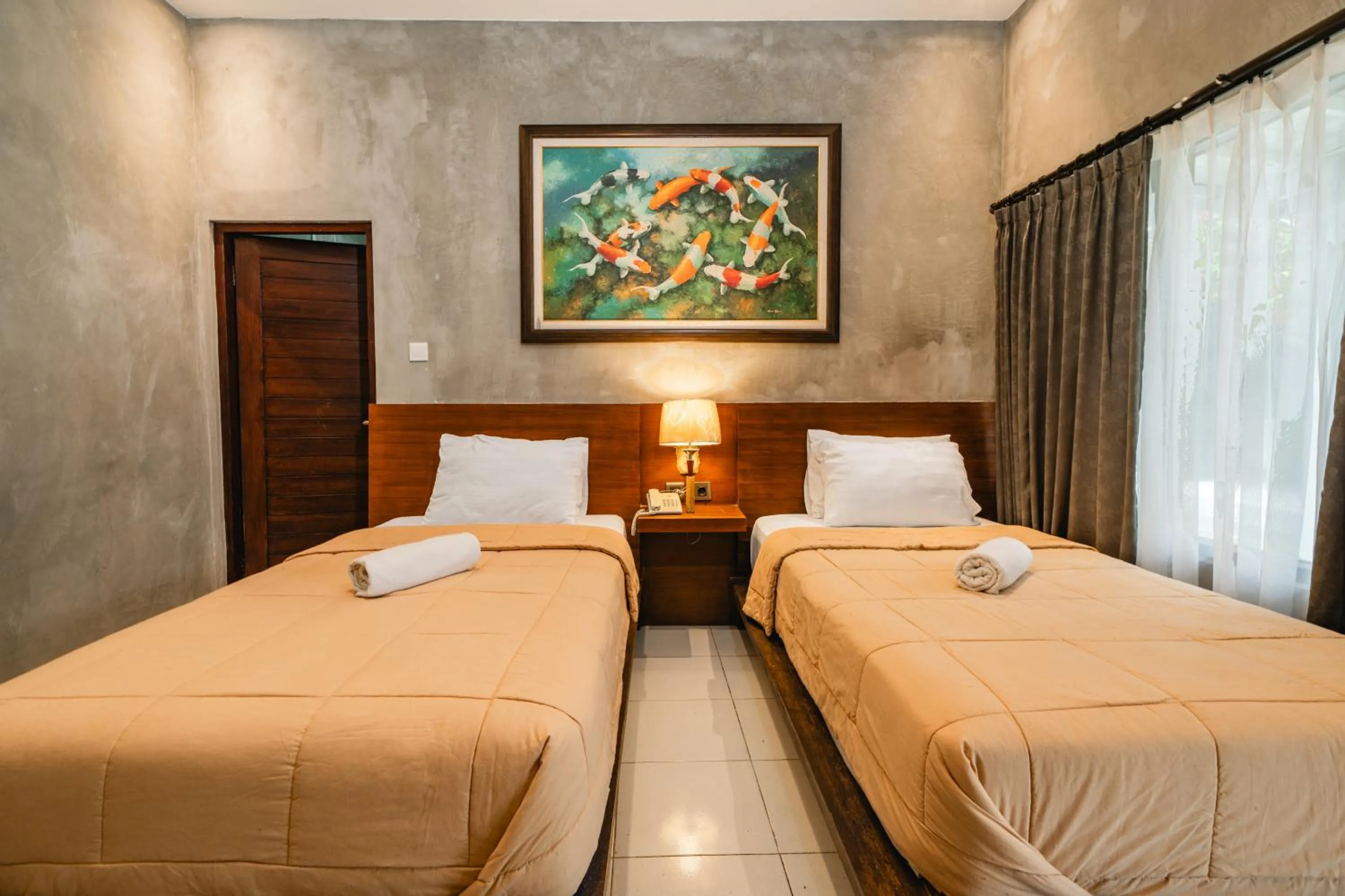 Bed in Uma Mani Villa Jimbaran