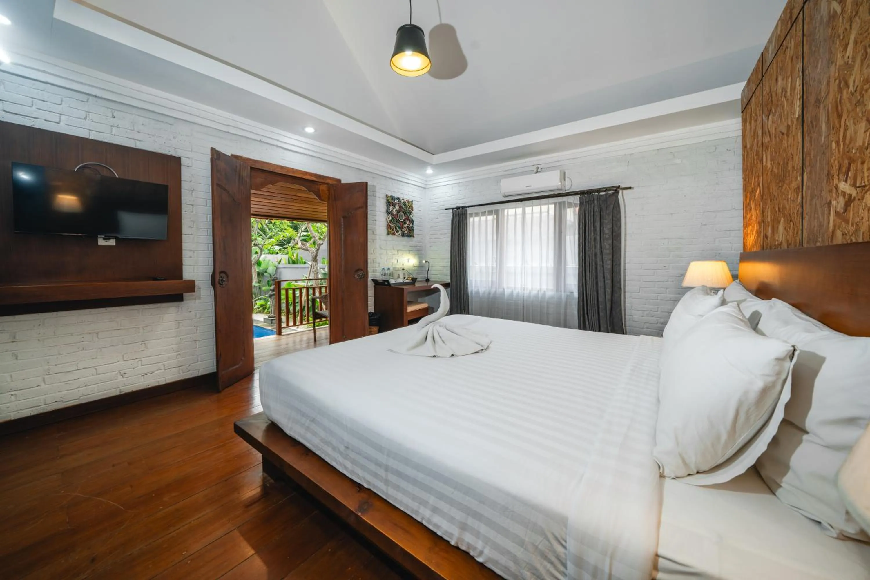 Bed in Uma Mani Villa Jimbaran