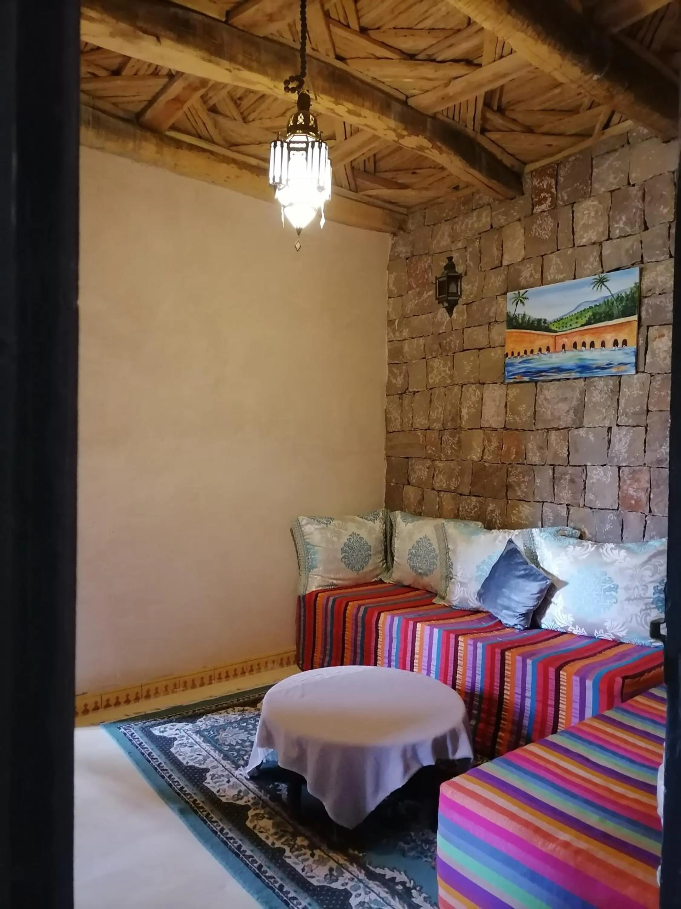 Living room, Bed in Chambre d'hôtes aya