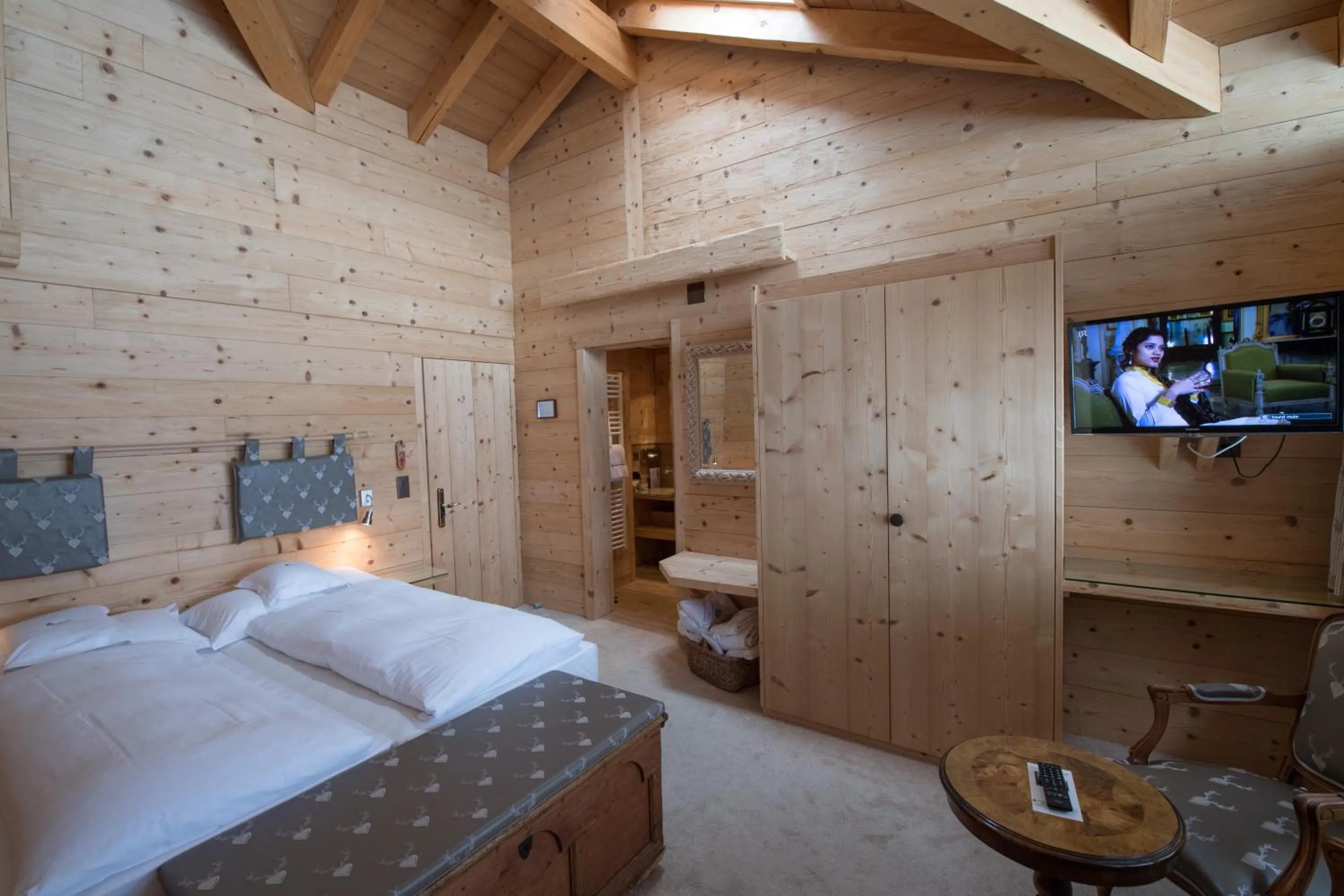 Photo of the whole room, Bed in Waldhotel Doldenhorn