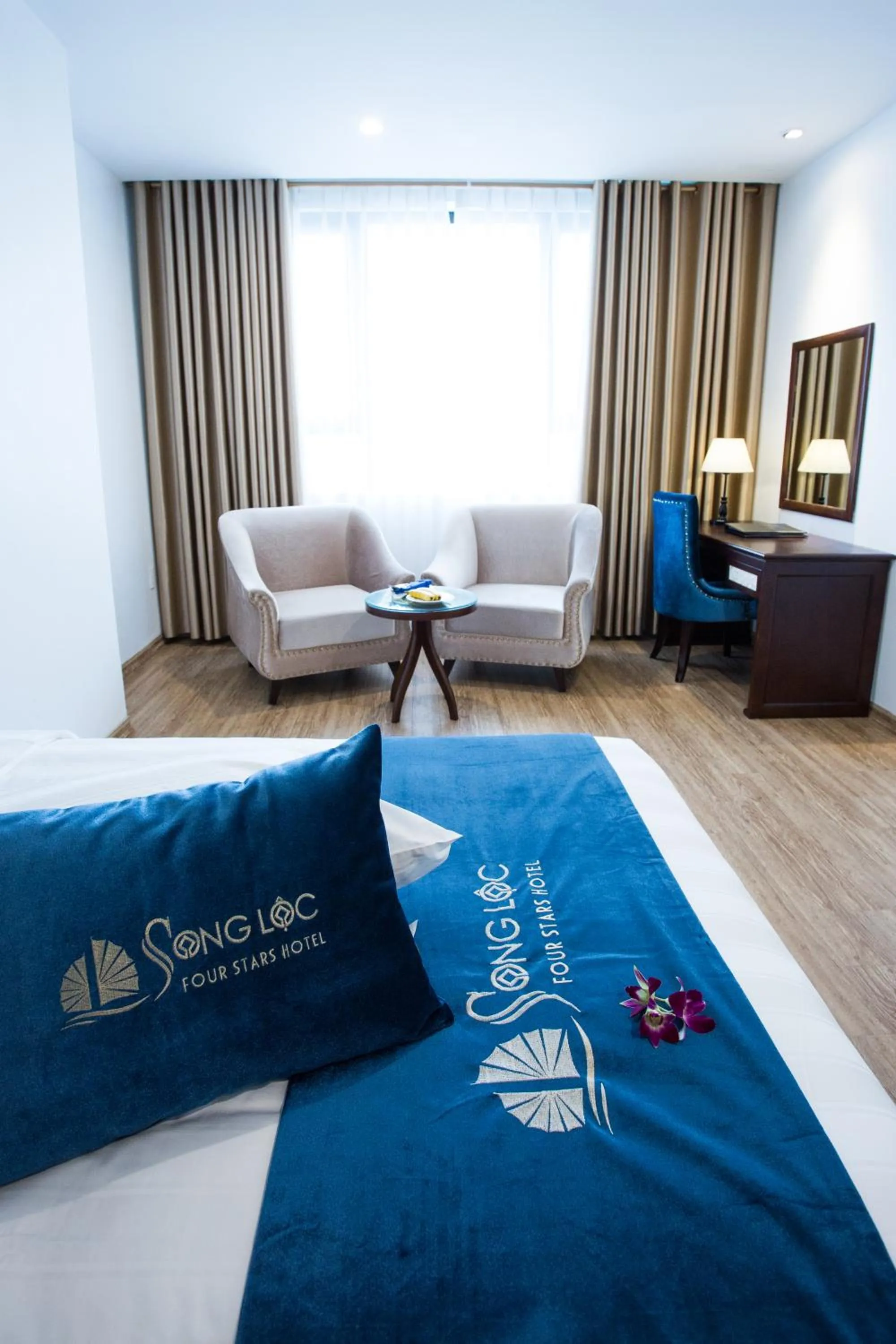 Bedroom in Song Loc Luxury Hotel