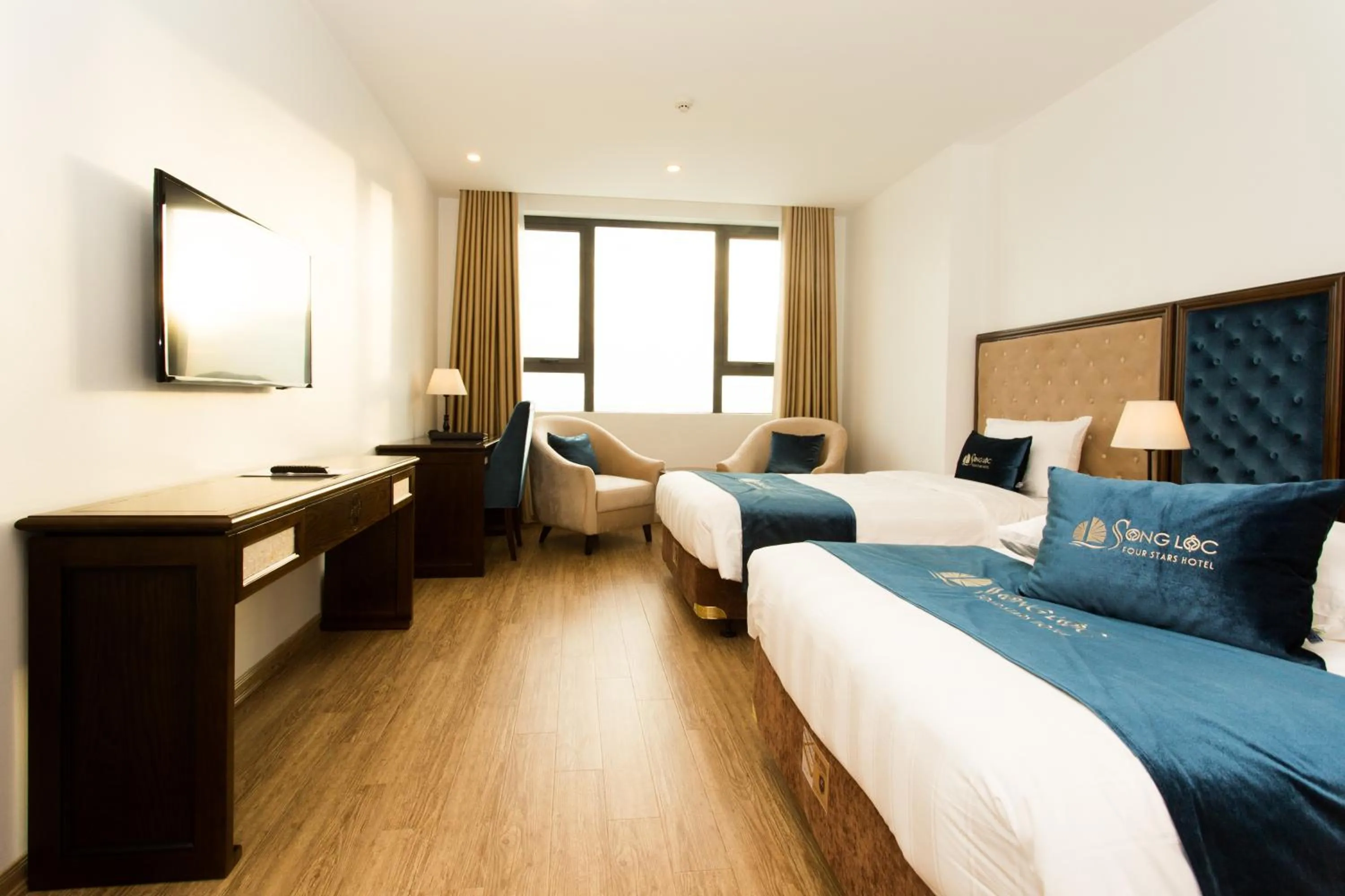 Bedroom in Song Loc Luxury Hotel