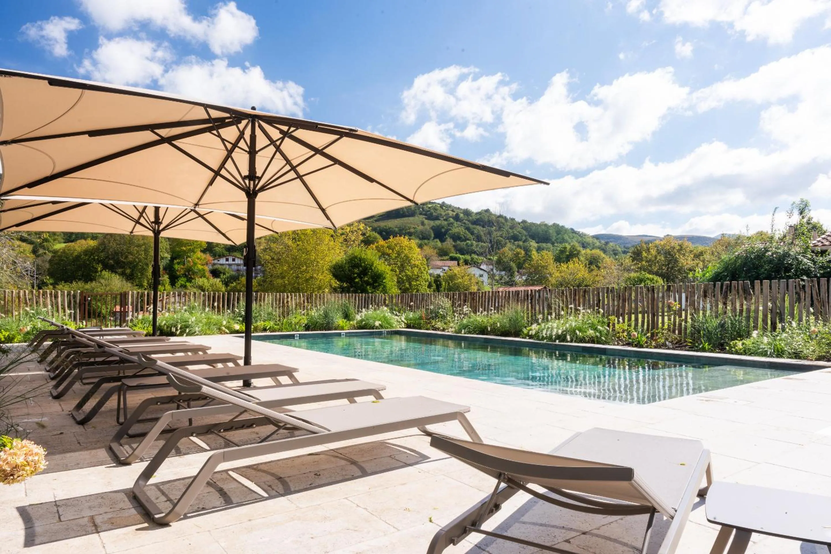 Pool view in Hôtel Restaurant & Spa La Maison Oppoca