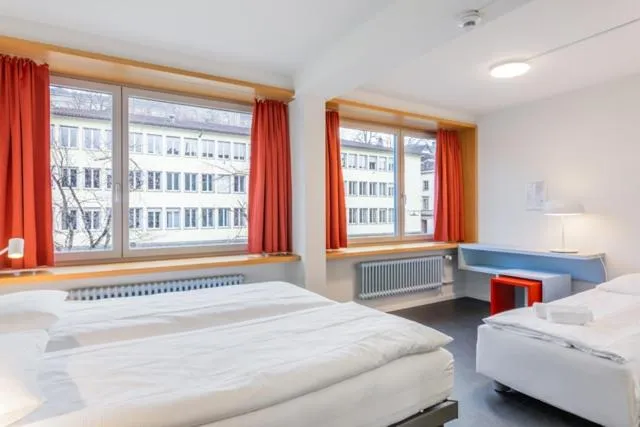 Bed in Hotel Marta - 1950's architecture in Zurich's vibrant old town, near main station