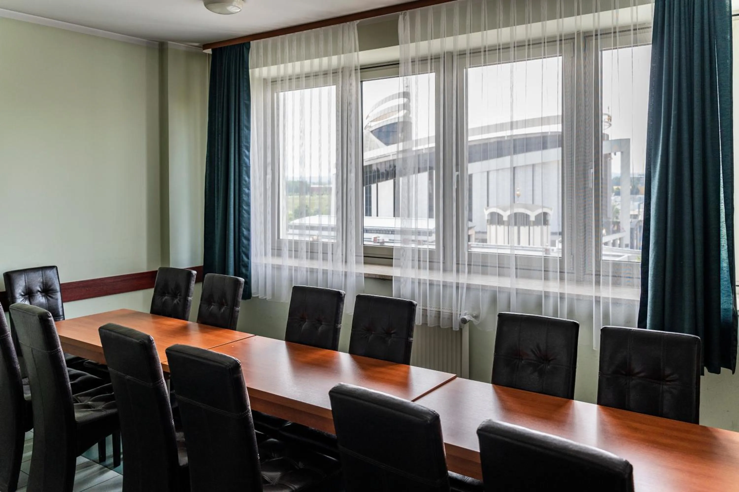 Communal lounge/ TV room in Dom Duszpasterski Sanktuarium Bożego Miłosierdzia