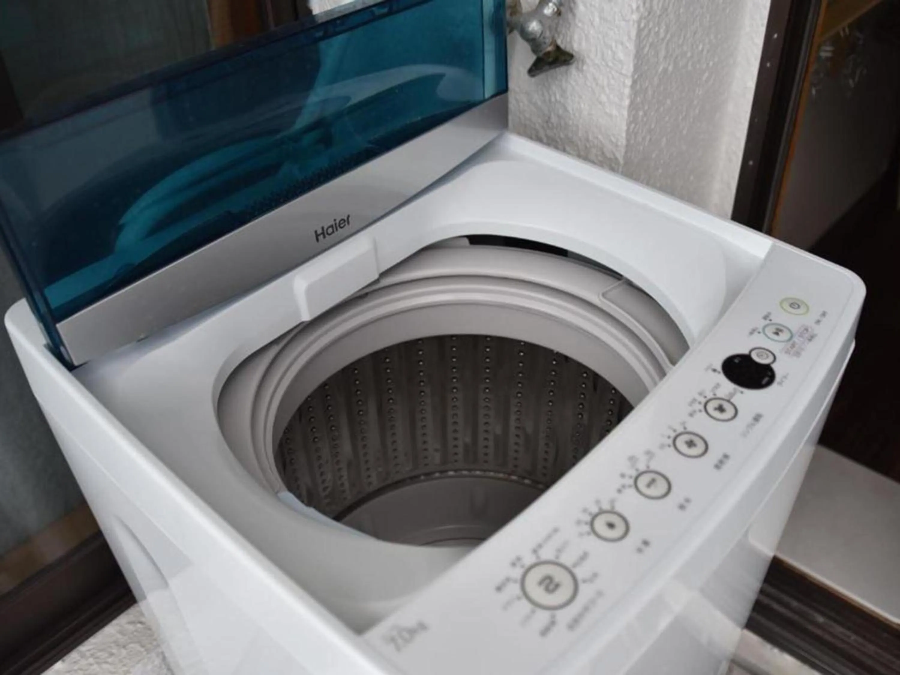 washing machine in Guesthouse Asibina