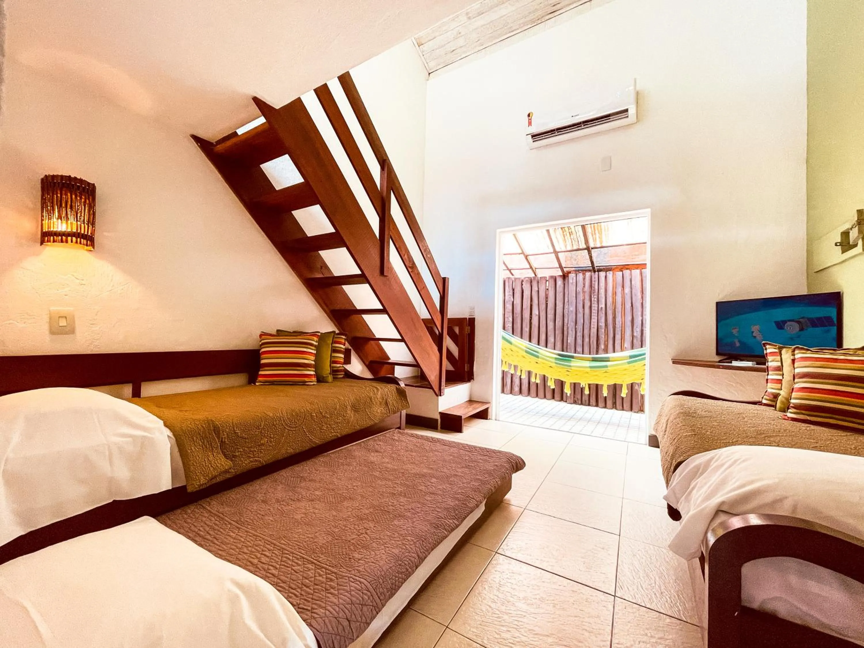 Photo of the whole room, Bed in Pousada Tatuapara