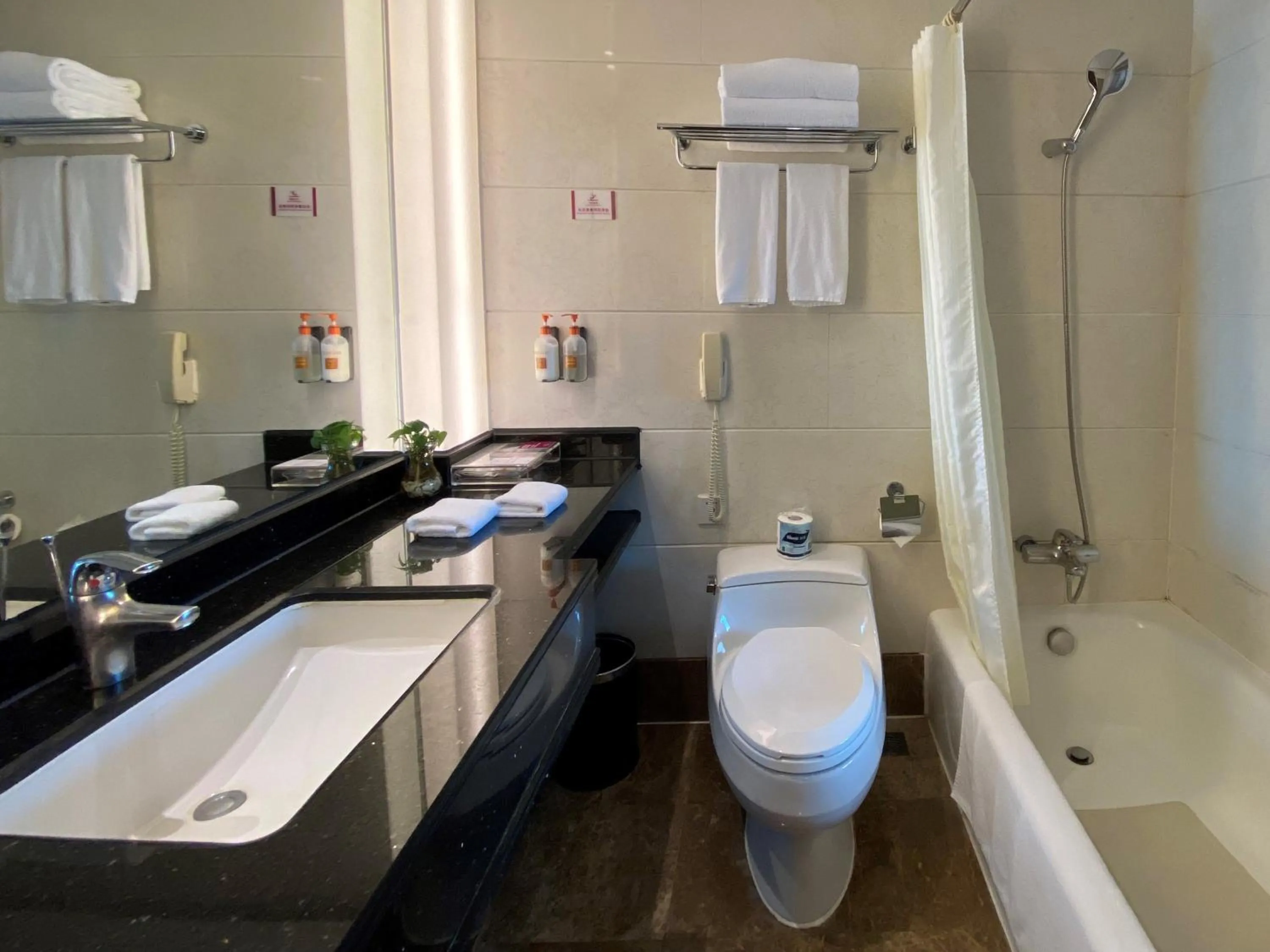 Bathroom in Crowne Plaza Chengdu City Center by IHG