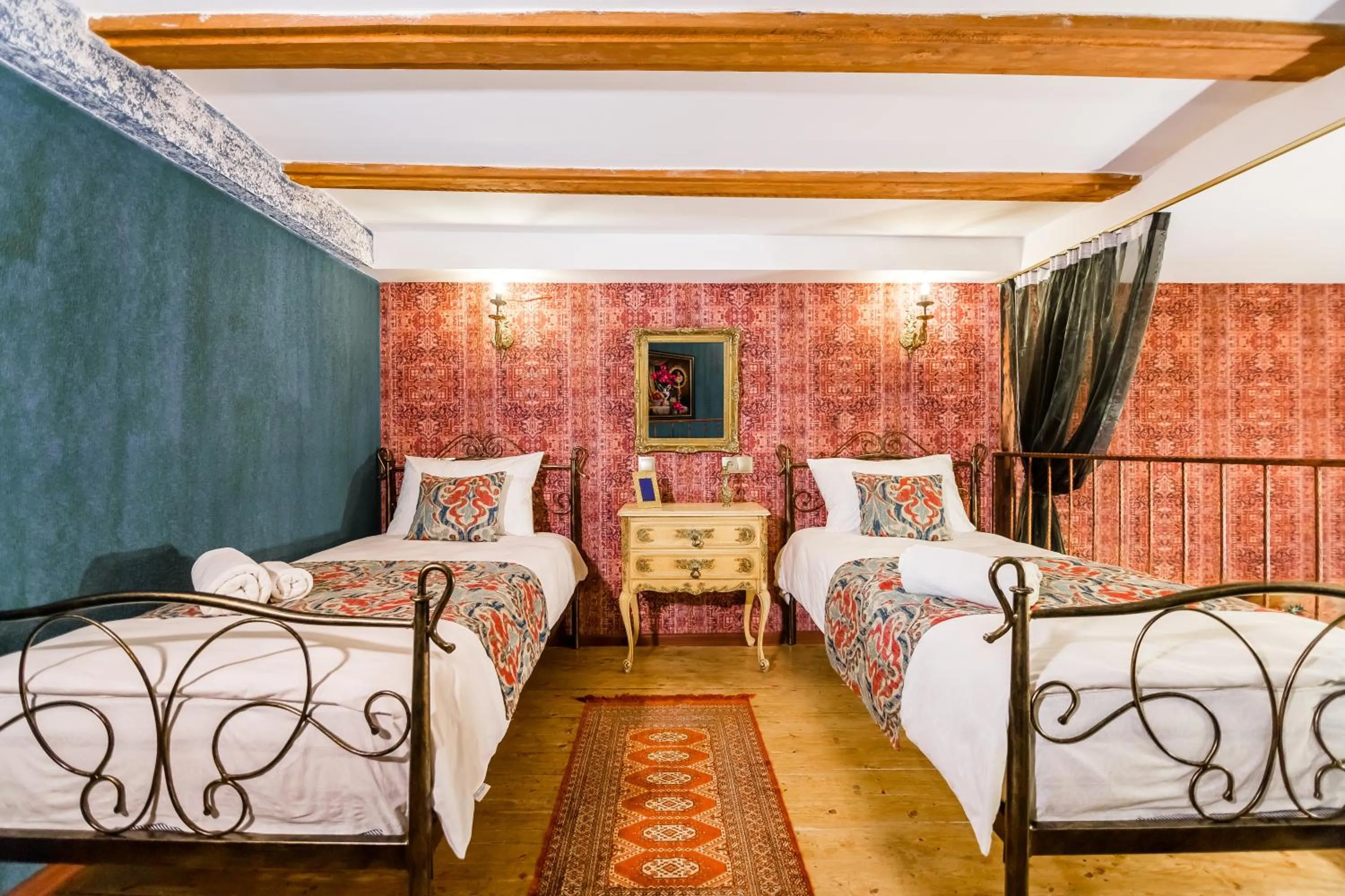 Bed in Tiflis Inn Boutique Hotel