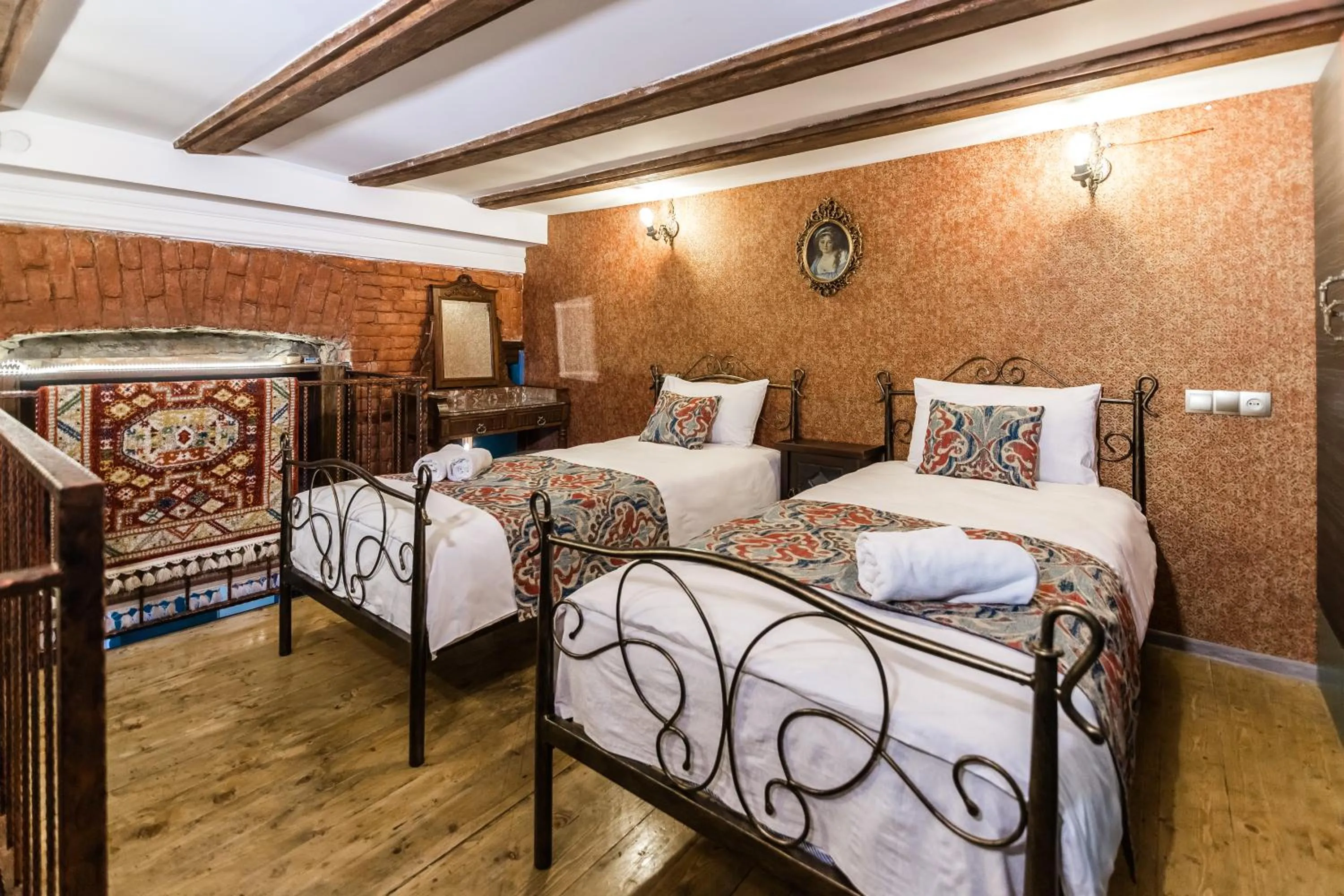 Bed in Tiflis Inn Boutique Hotel