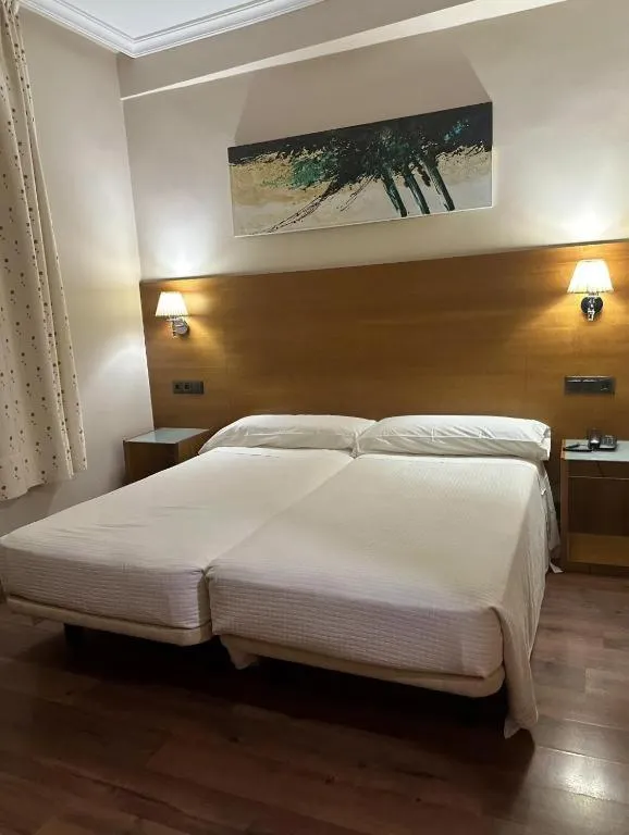 Bed in Hotel Nova Roma