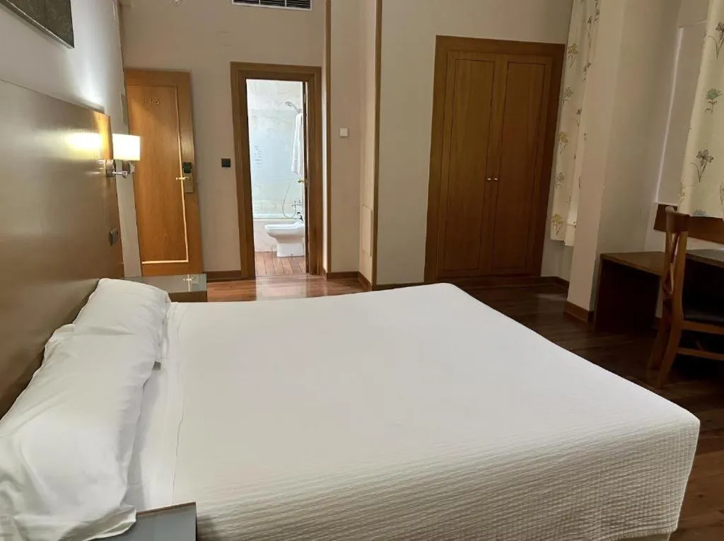 Bed in Hotel Nova Roma
