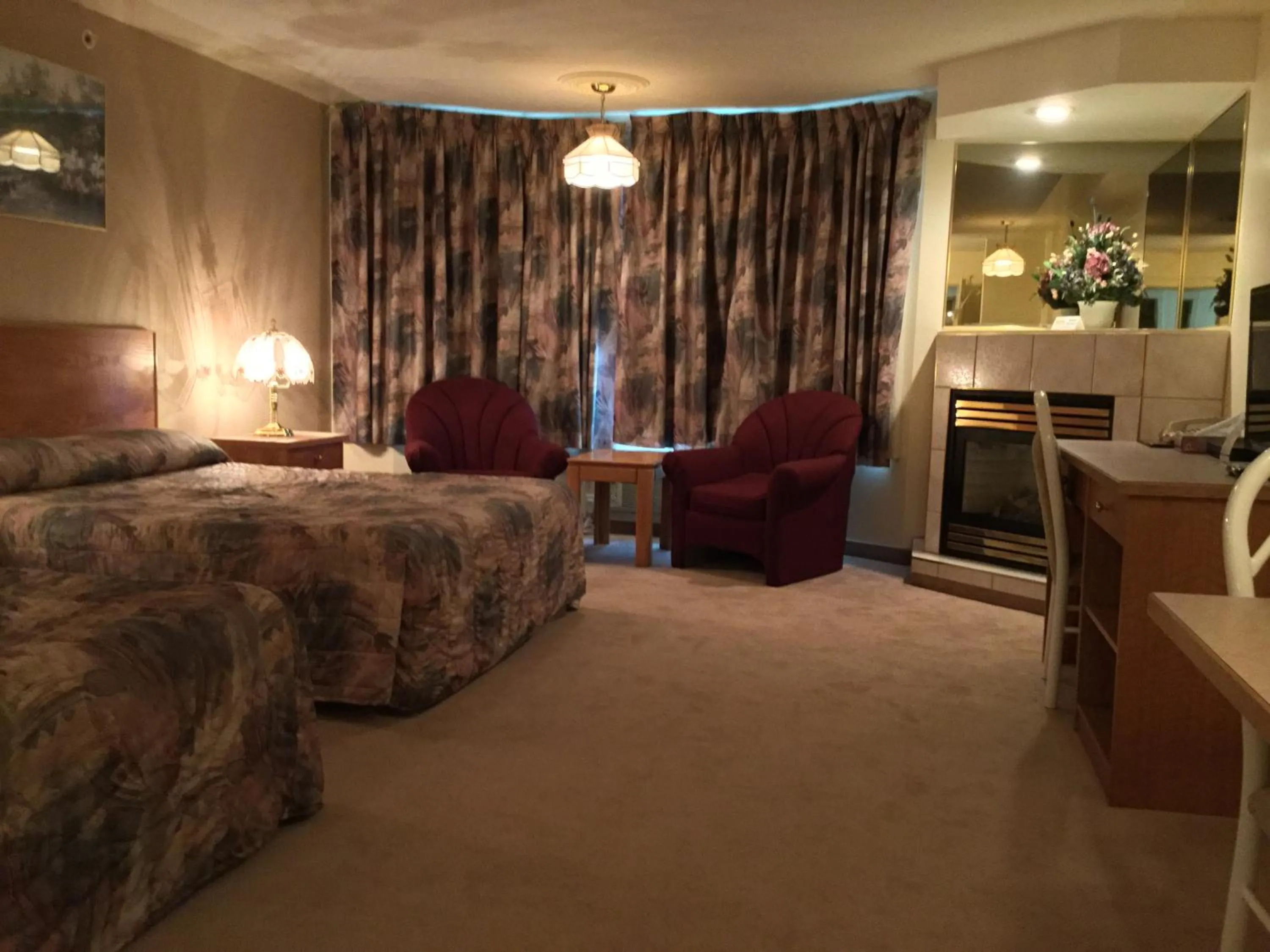 Bed in Western Budget Motel #2 Grande Prairie