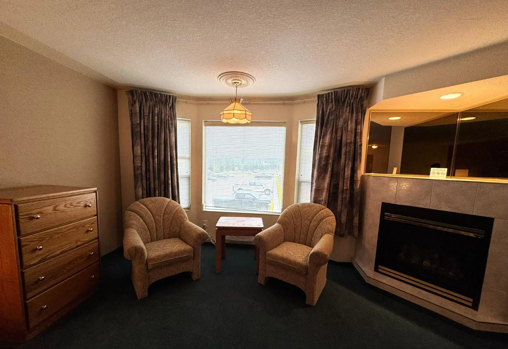 Seating area in Western Budget Motel #3 Whitecourt