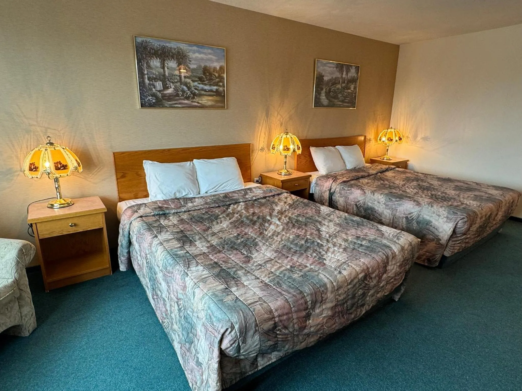 Bed in Western Budget Motel #3 Whitecourt