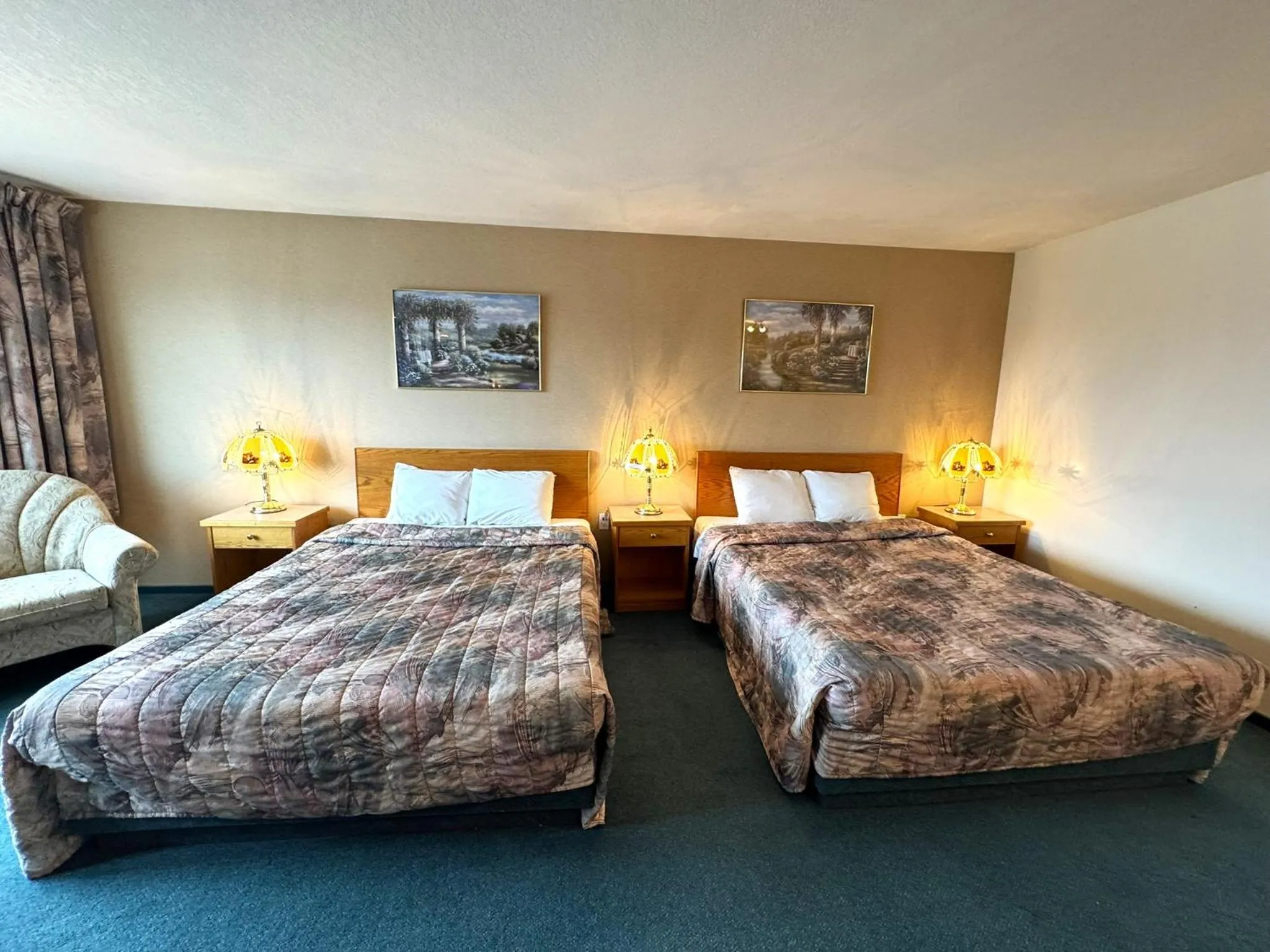 Bed in Western Budget Motel #3 Whitecourt