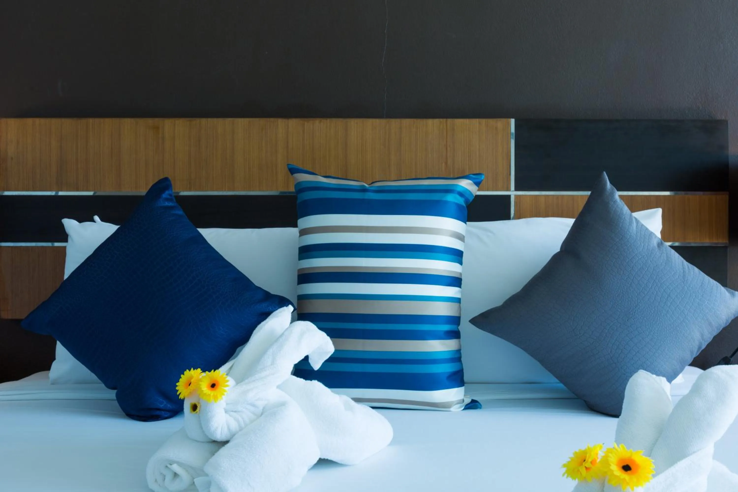 Bed in Vogue Pattaya Hotel