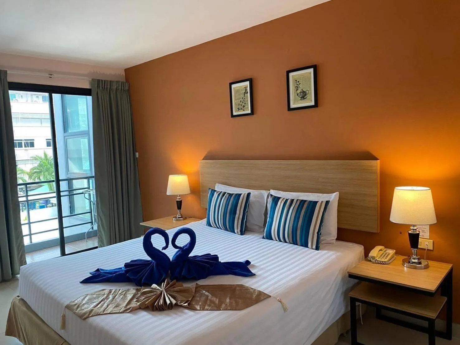 Bed in Vogue Pattaya Hotel