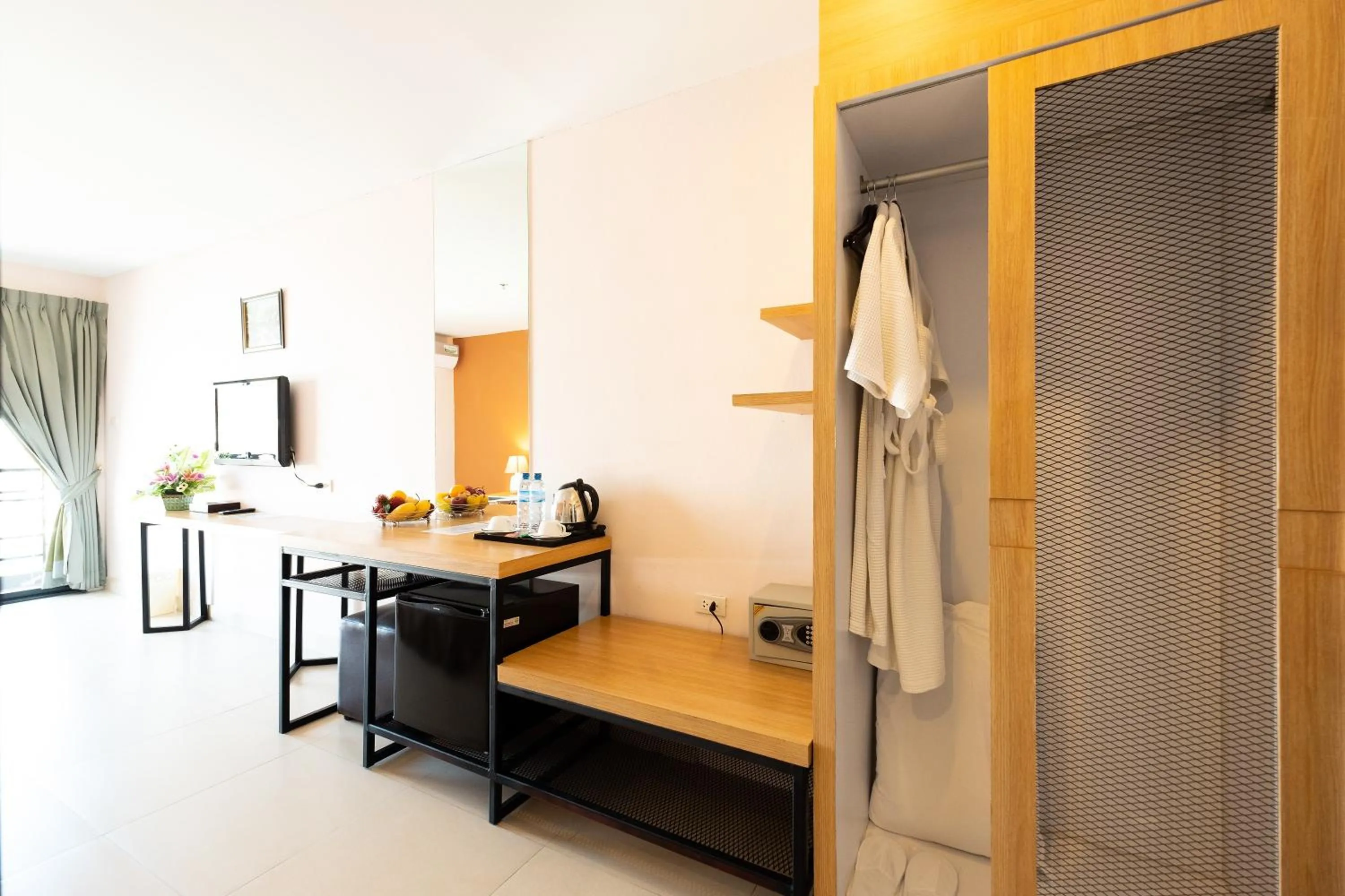 Communal lounge/ TV room in Vogue Pattaya Hotel