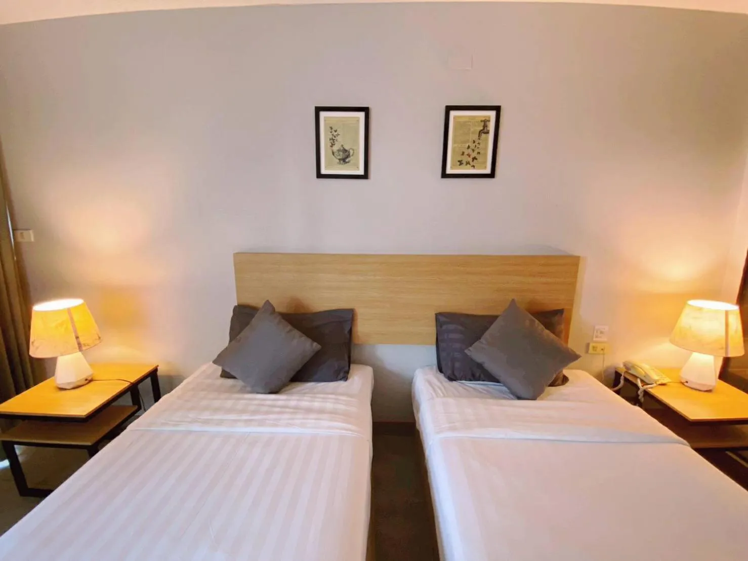 Bed in Vogue Pattaya Hotel