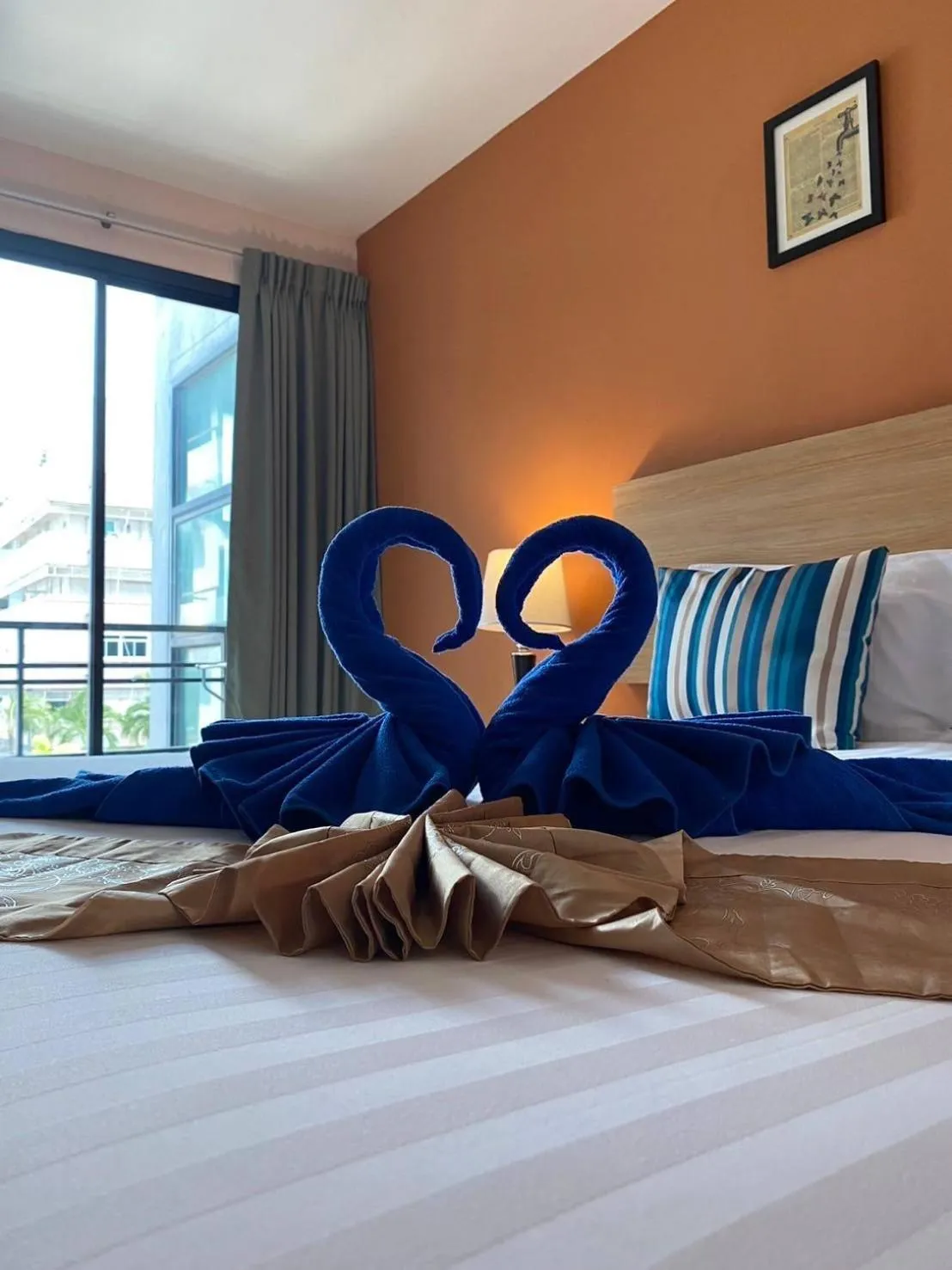 Bed in Vogue Pattaya Hotel