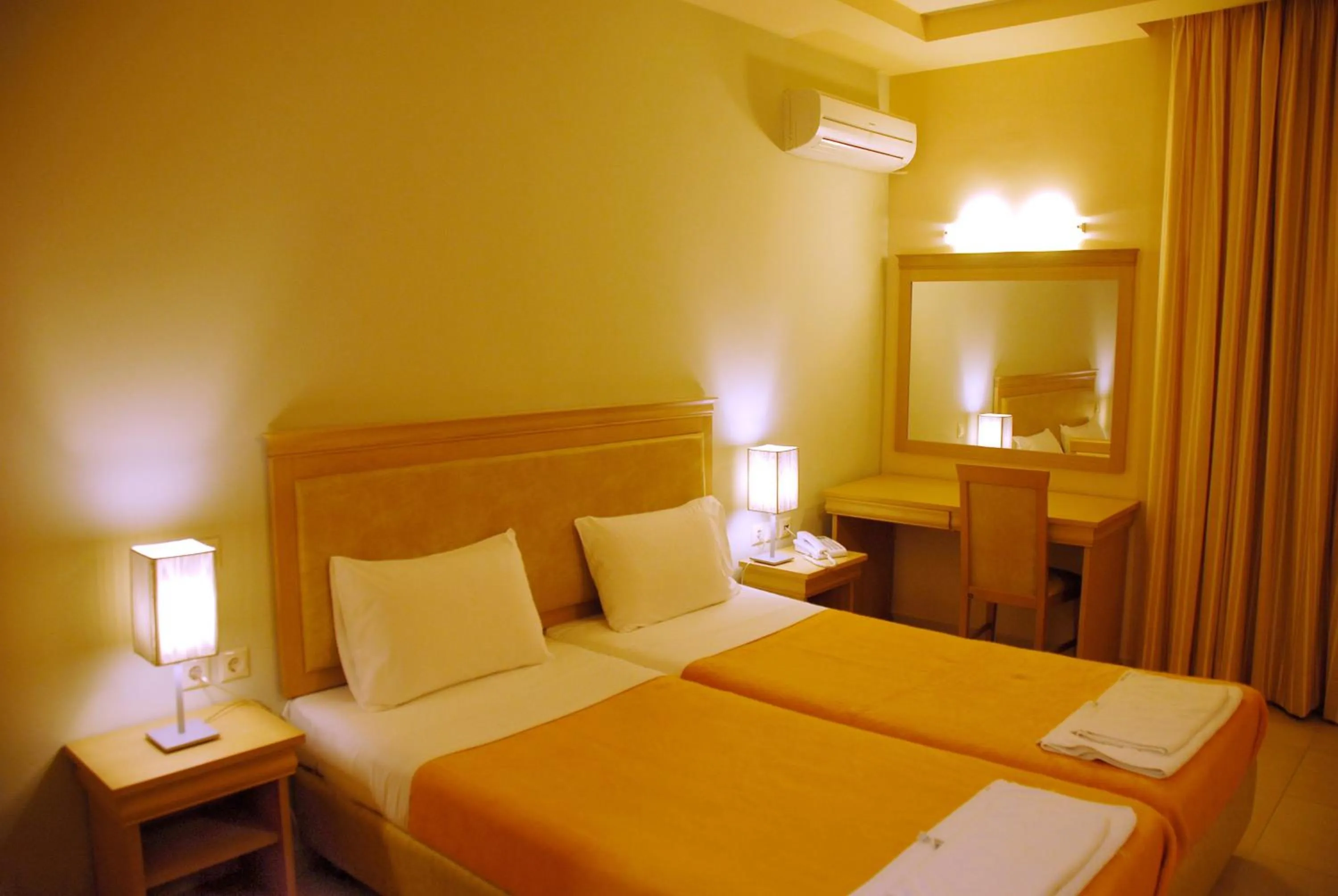 Bed in Glyfada Beach Hotel