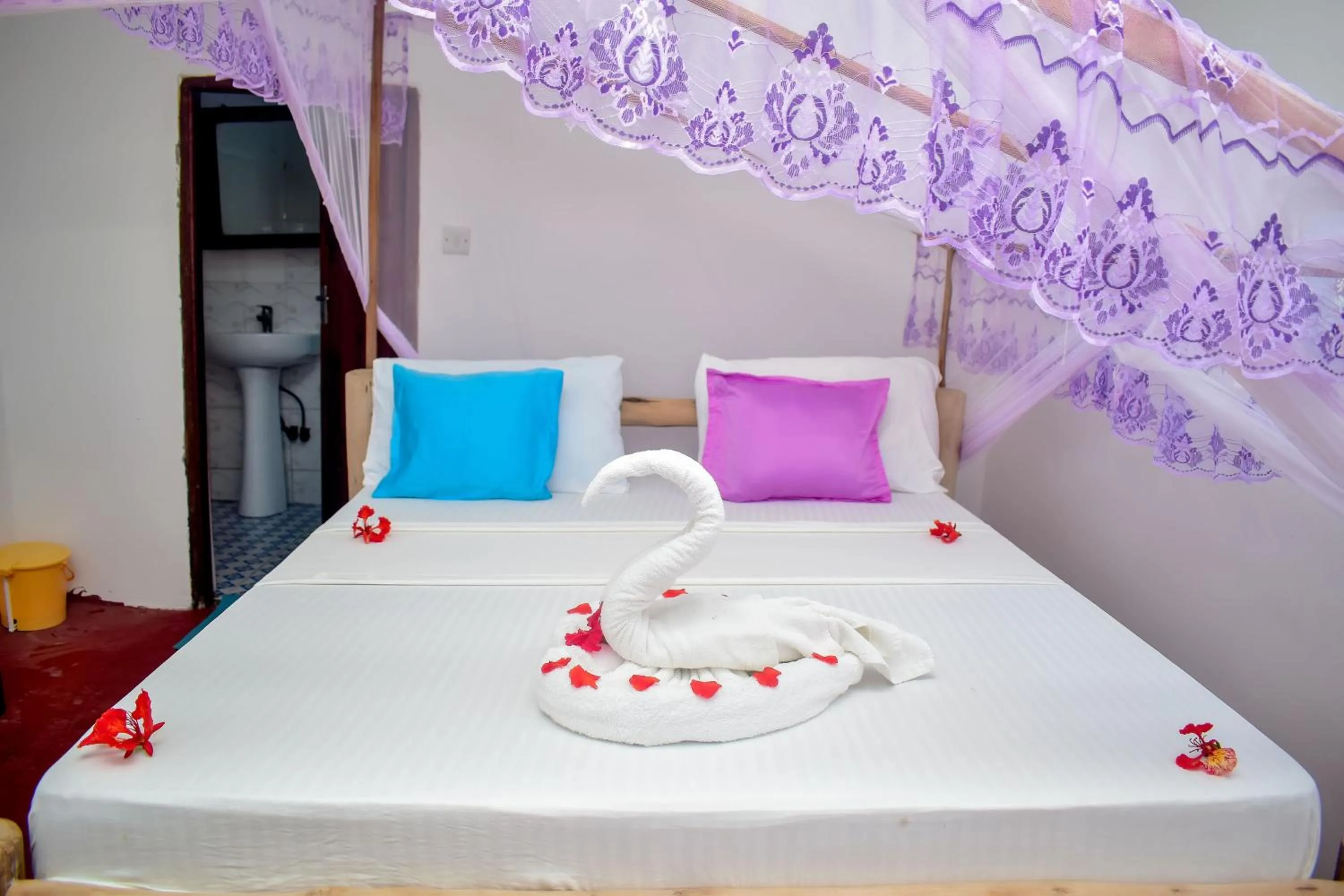 Bed in Blue Earth Beach Bungalow