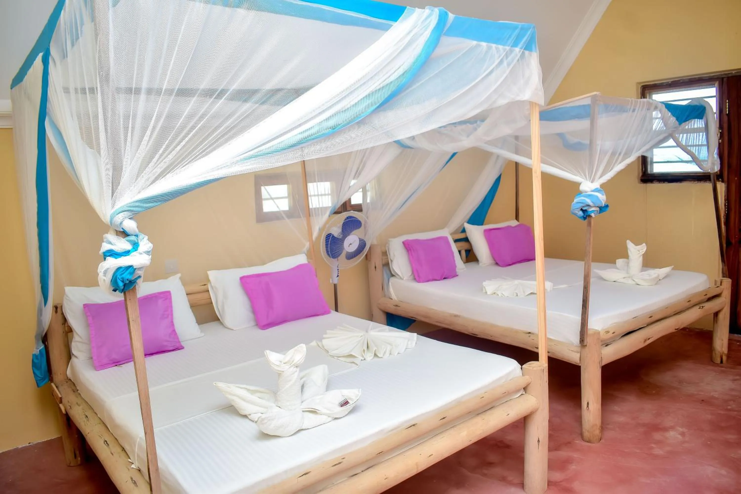 Bed in Blue Earth Beach Bungalow
