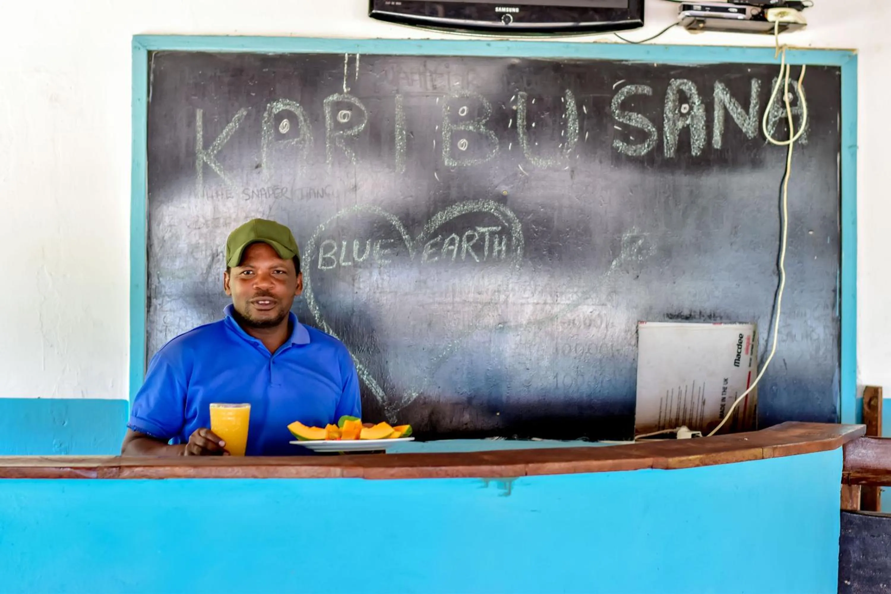 People in Blue Earth Beach Bungalow