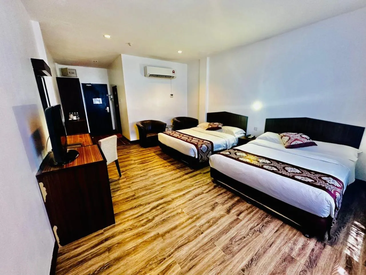 Bed in De Baron Resort