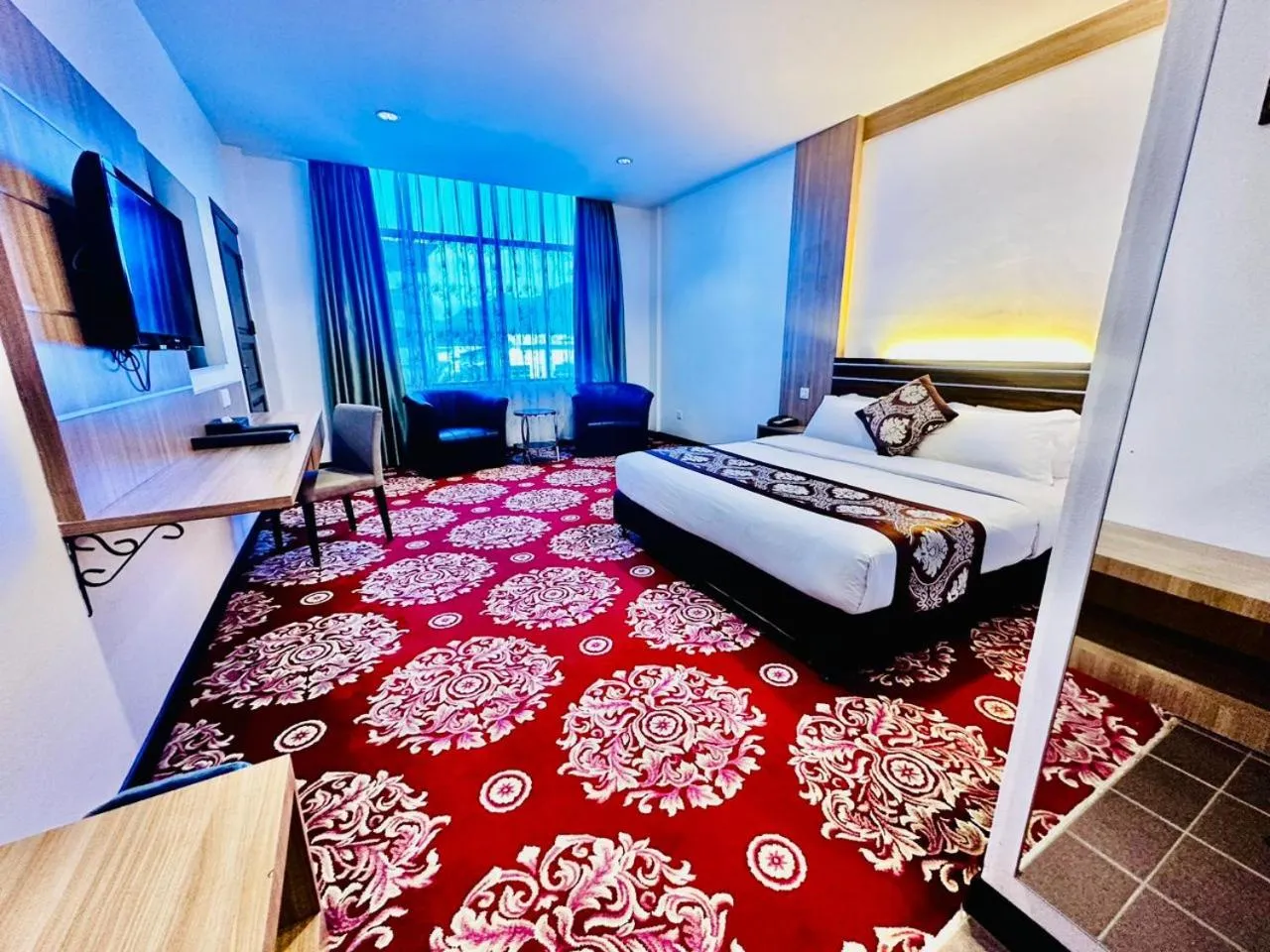 Bed in De Baron Resort