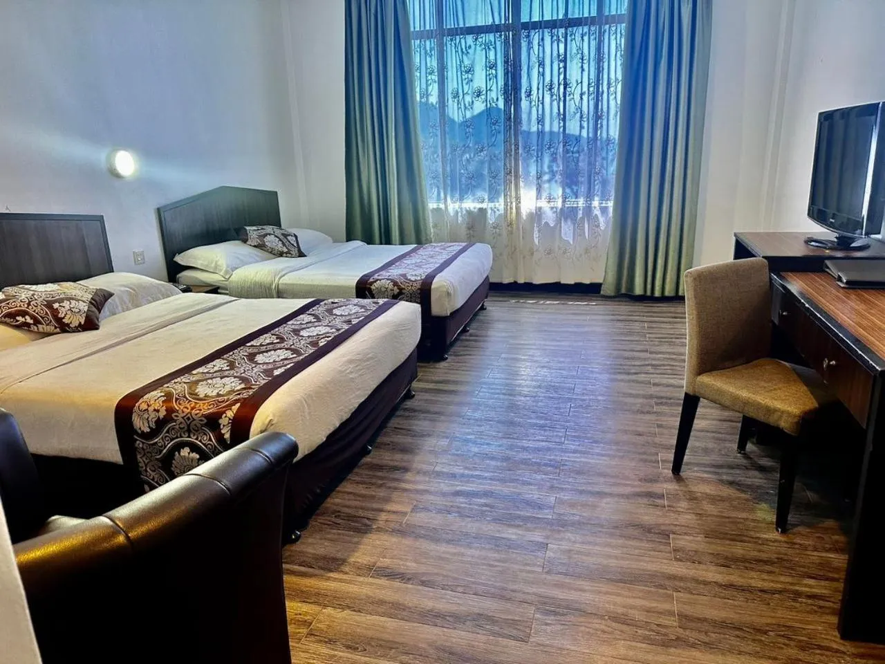 Bed in De Baron Resort