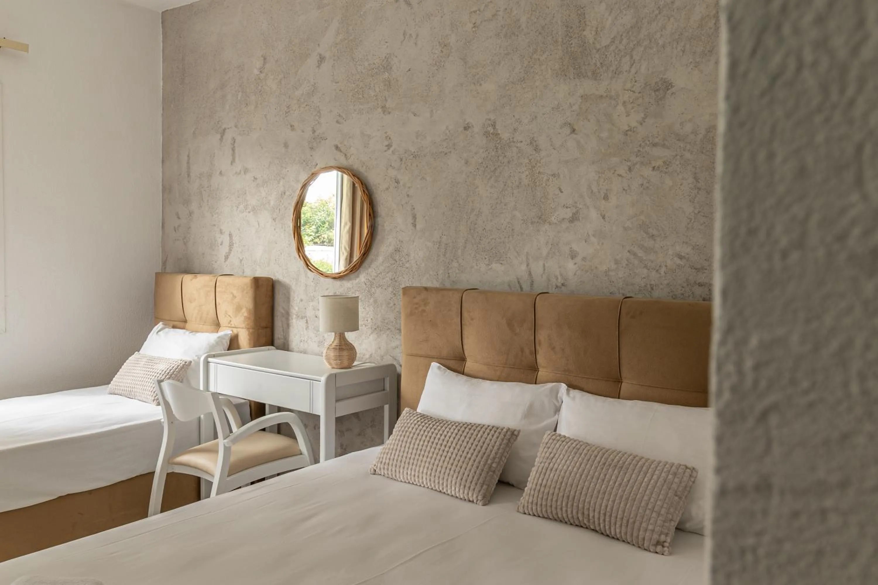 Bed in Theo Bungalows Boutique Hotel