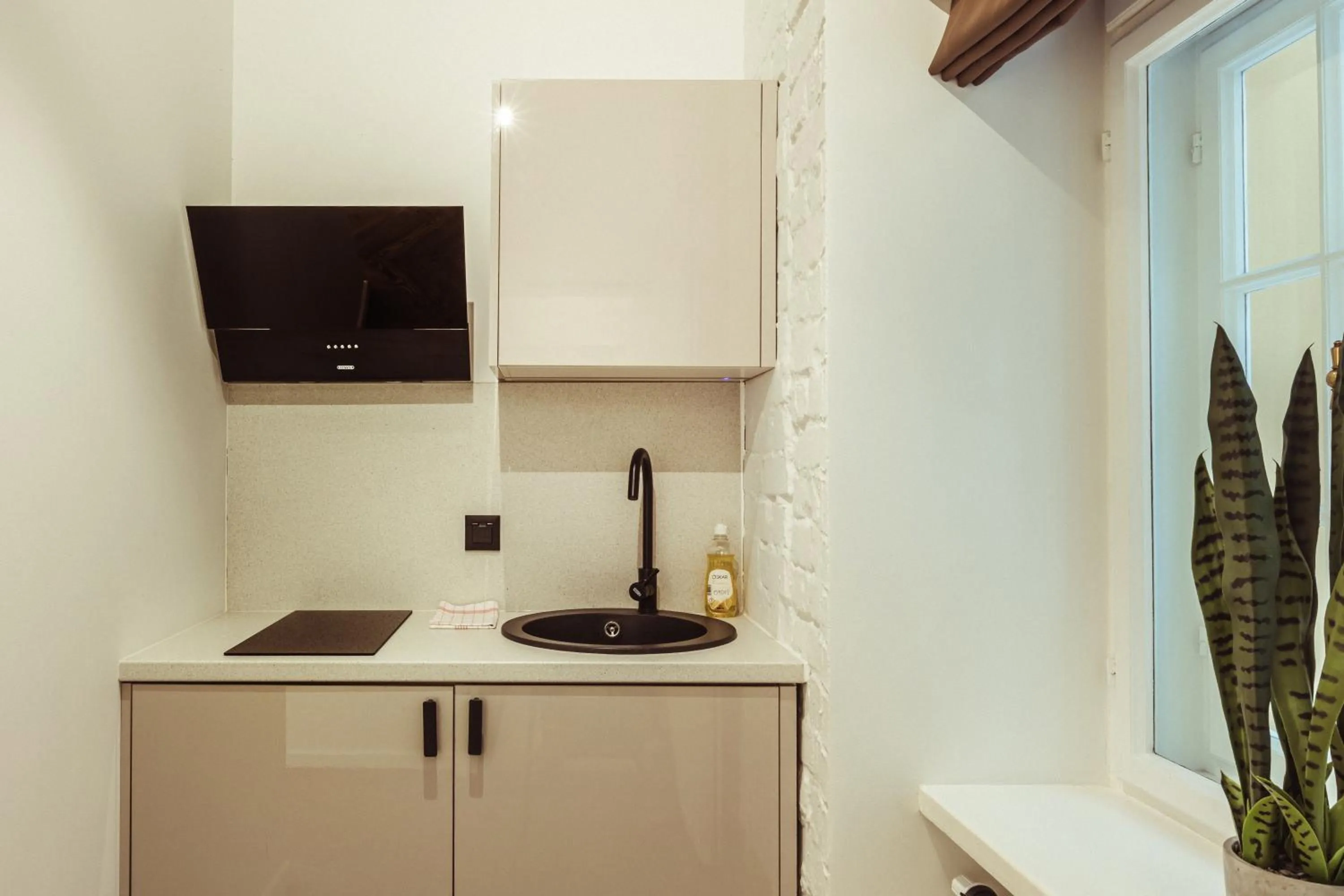 Kitchen or kitchenette in Konventa Sēta Hotel - Keystone Collection