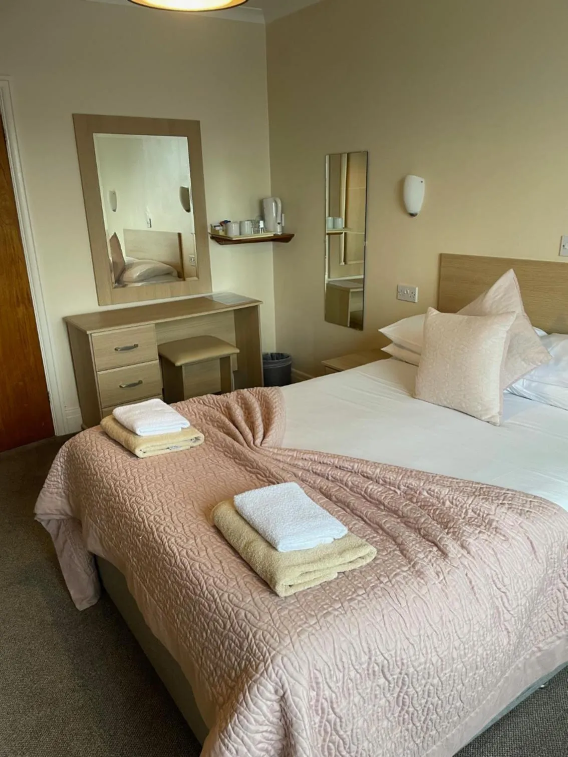 Bed in Merlewood Hotel