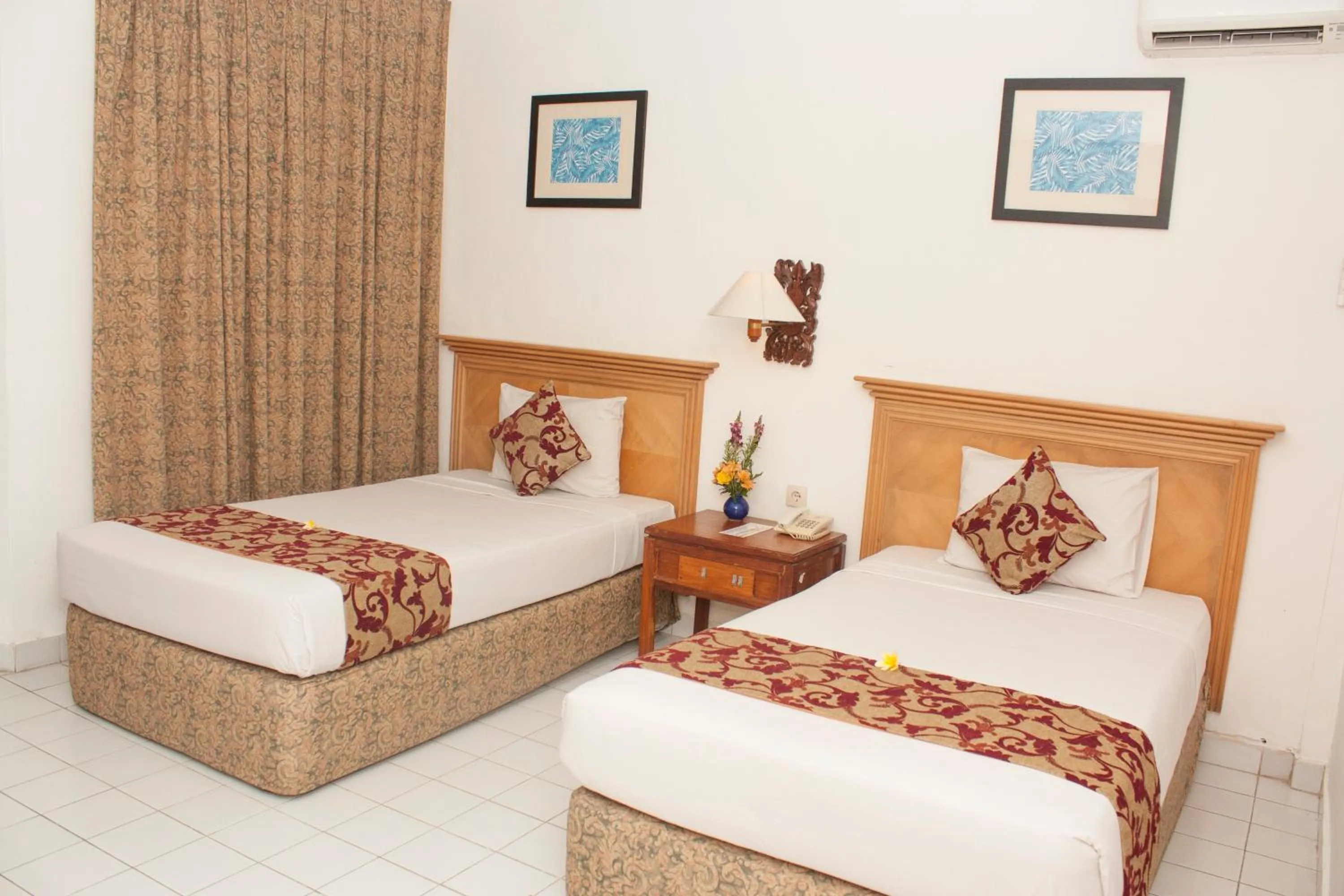 Bed in Seminyak Paradiso Hotel