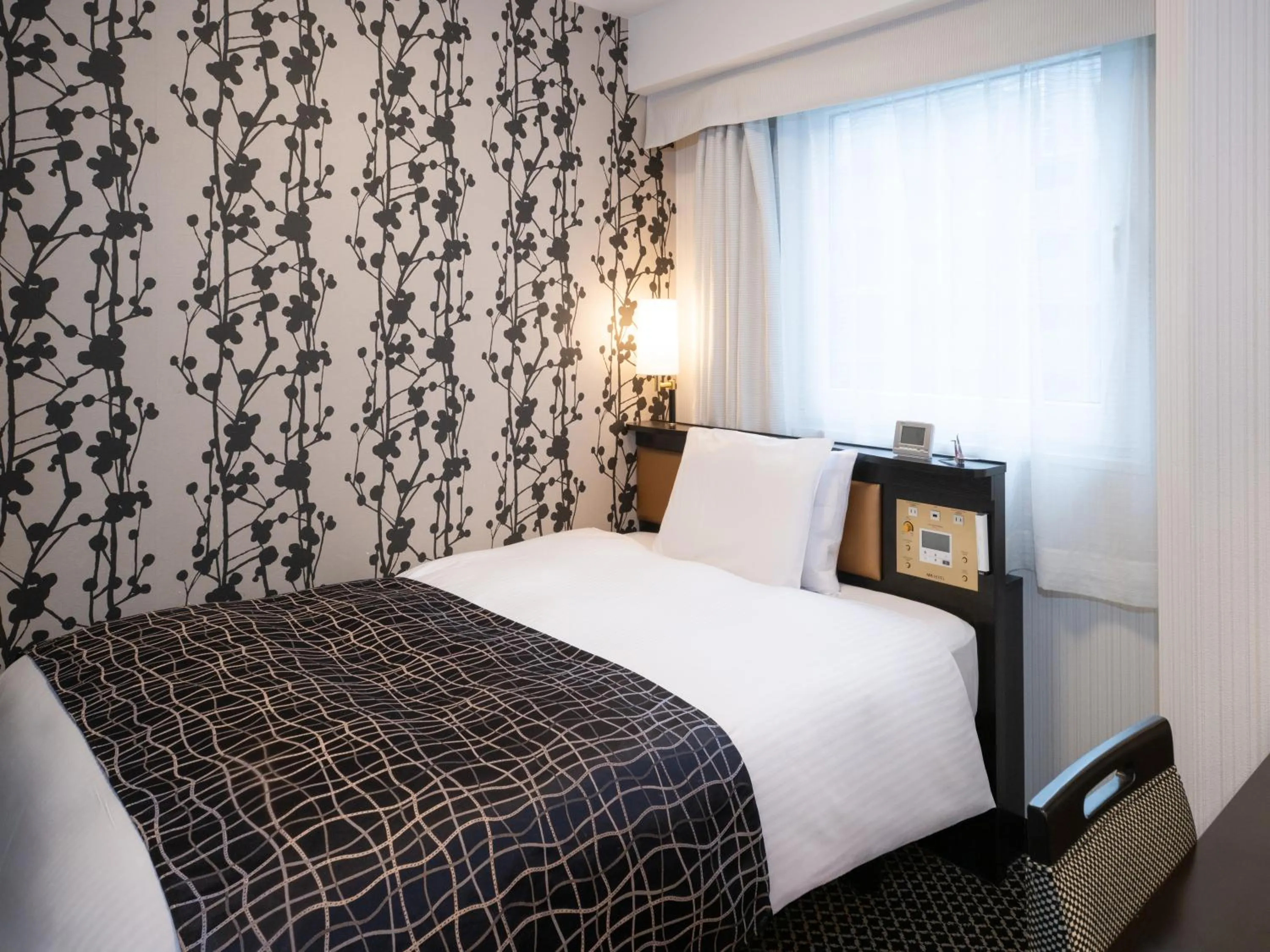 Bed in APA Hotel Iidabashi Ekiminami