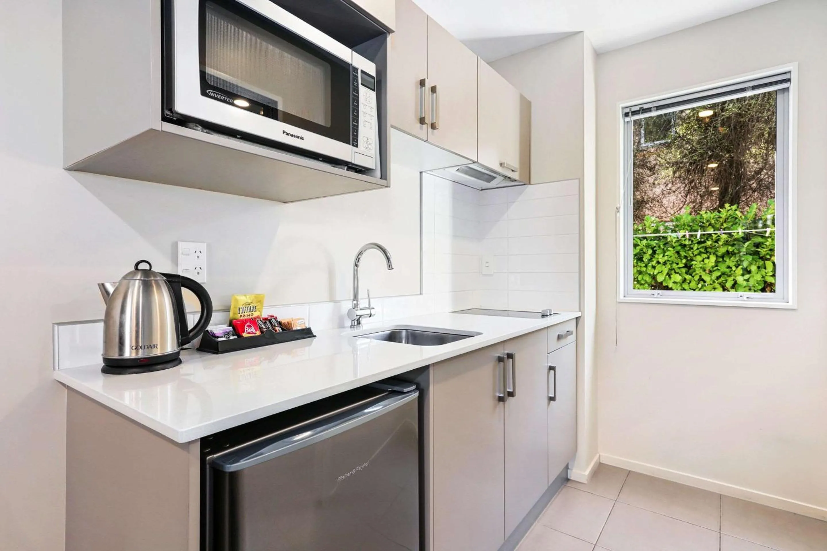 Kitchen or kitchenette in Quality Suites Amore