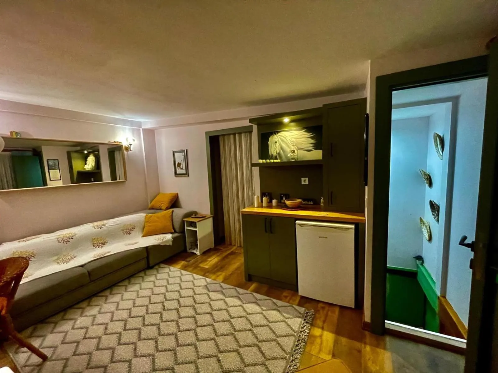 Living room, Bed in The Suite Apart Hotel