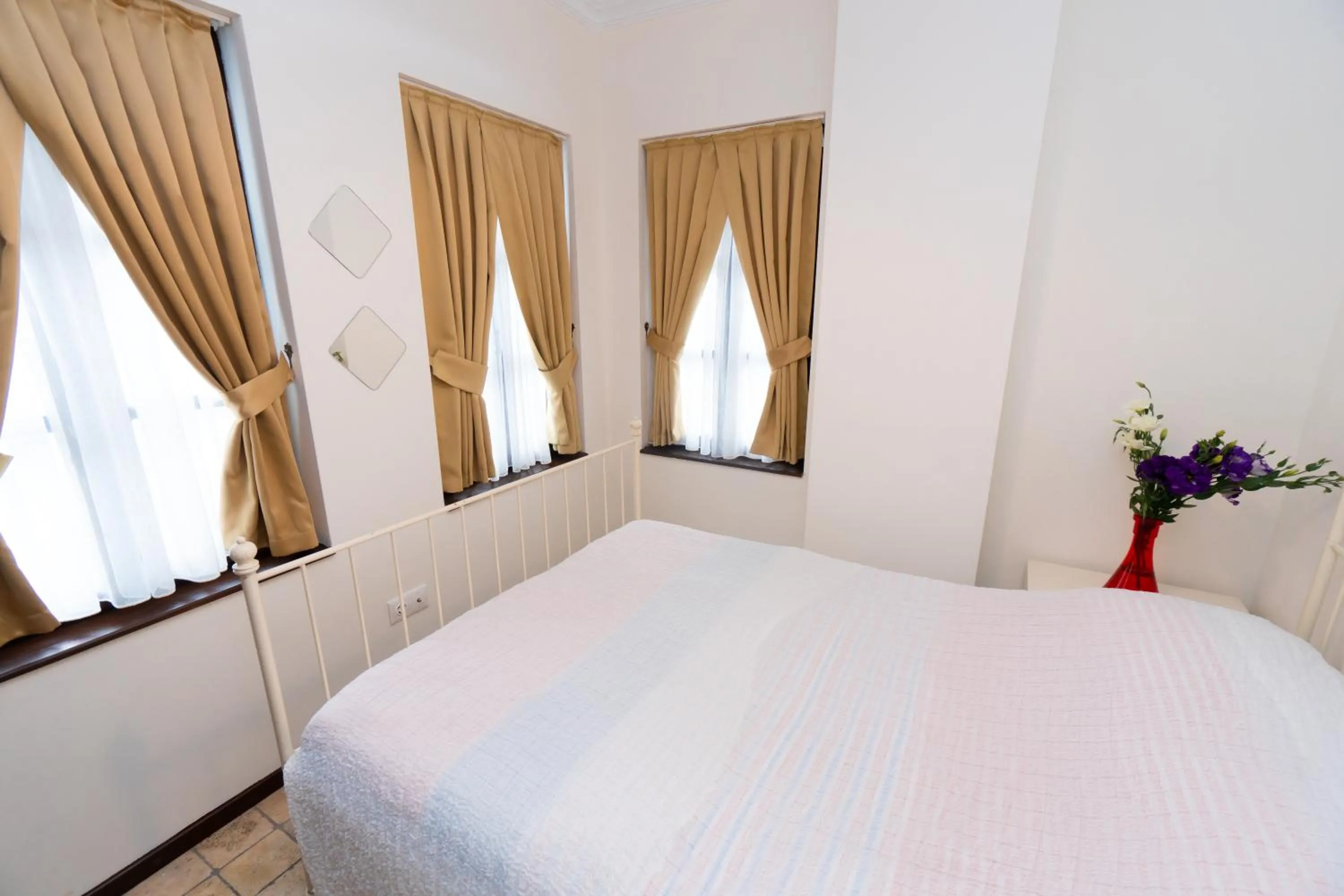 Bed in The Suite Apart Hotel