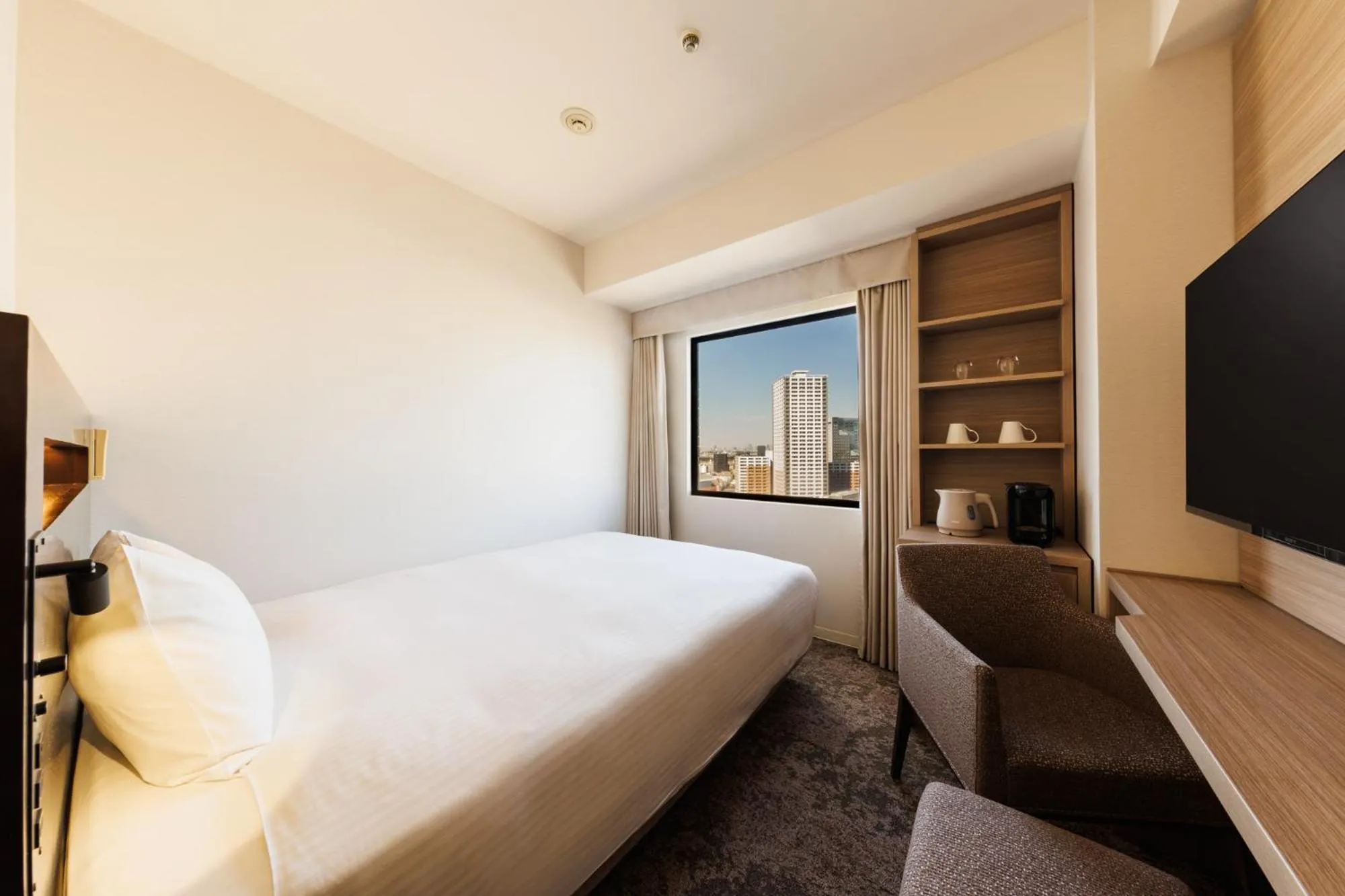 Bed in Kawasaki Nikko Hotel