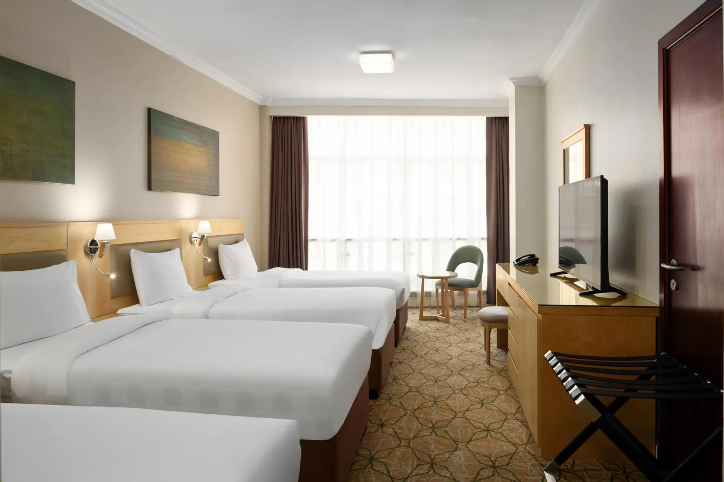 Standard 4 bed Courtyard View in SAJA By Warwick Madinah Hotel Standard 4 bed Courtyard View in SAJA By Warwick Madinah Hotel